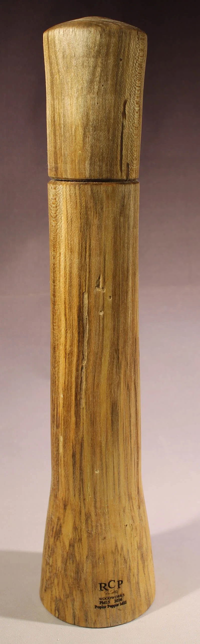 PM15
Poplar crush grind pepper mill with worm holes
12 ½” high, 2 ⅜” bottom diameter, 2 ⅝” top diameter
Finished with Danish oil
$85