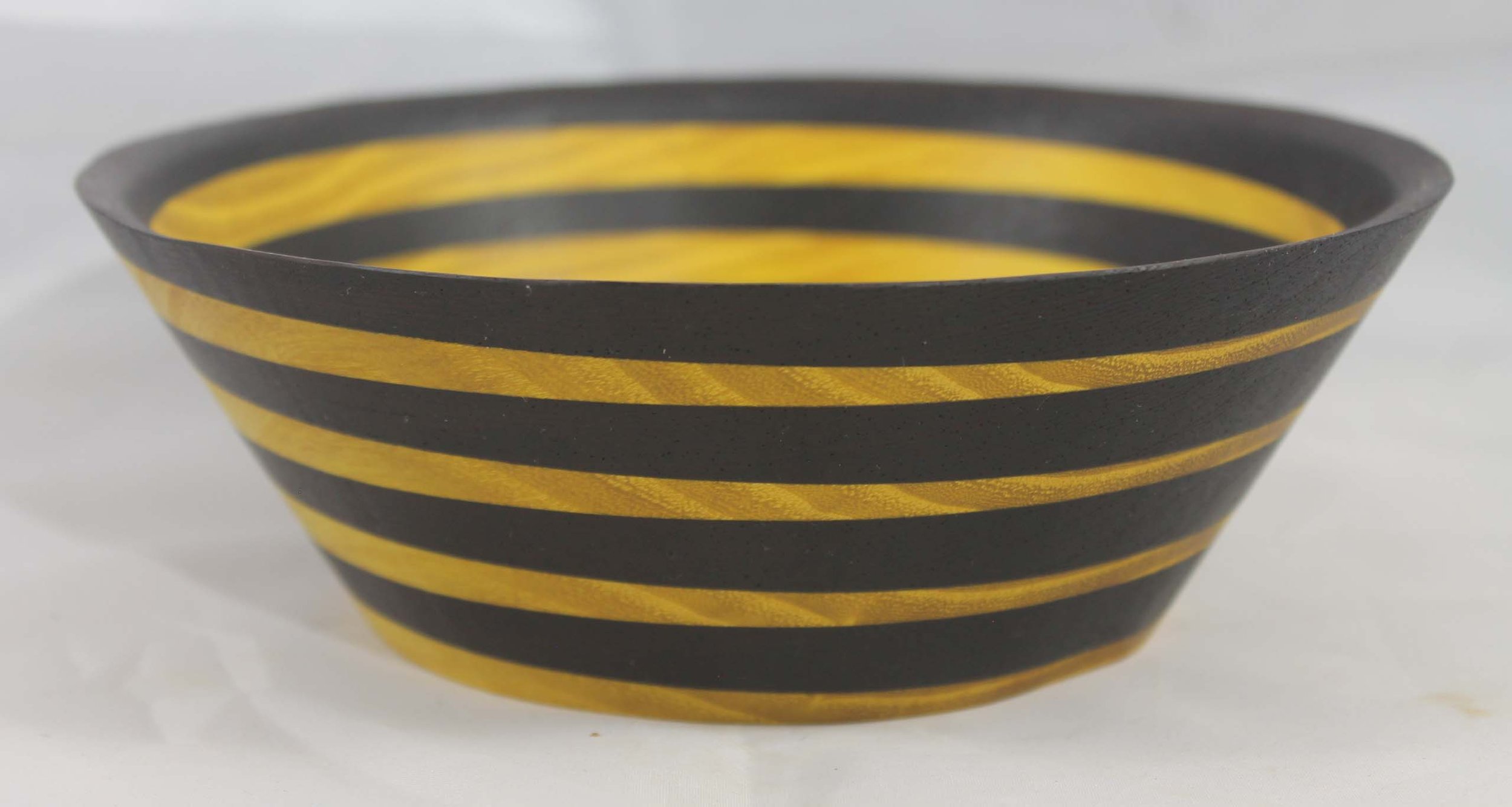 #6323 - Wenge / Osage Orange Wedge Bowl
Round
7¼” ɸ x 2 ½” high
Finished with Walnut Oil
$55