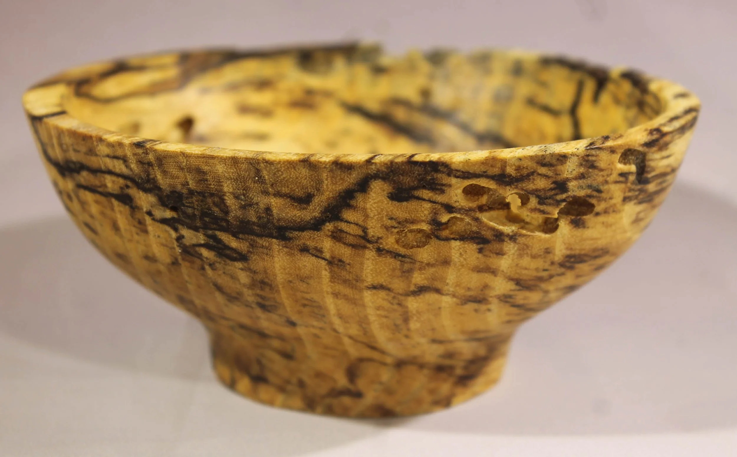 6395
Spalted Poplar round bowl
5 ¹⁄₈" diameter x 2 ⅜” high.
Finished with Danish oil.
$55
