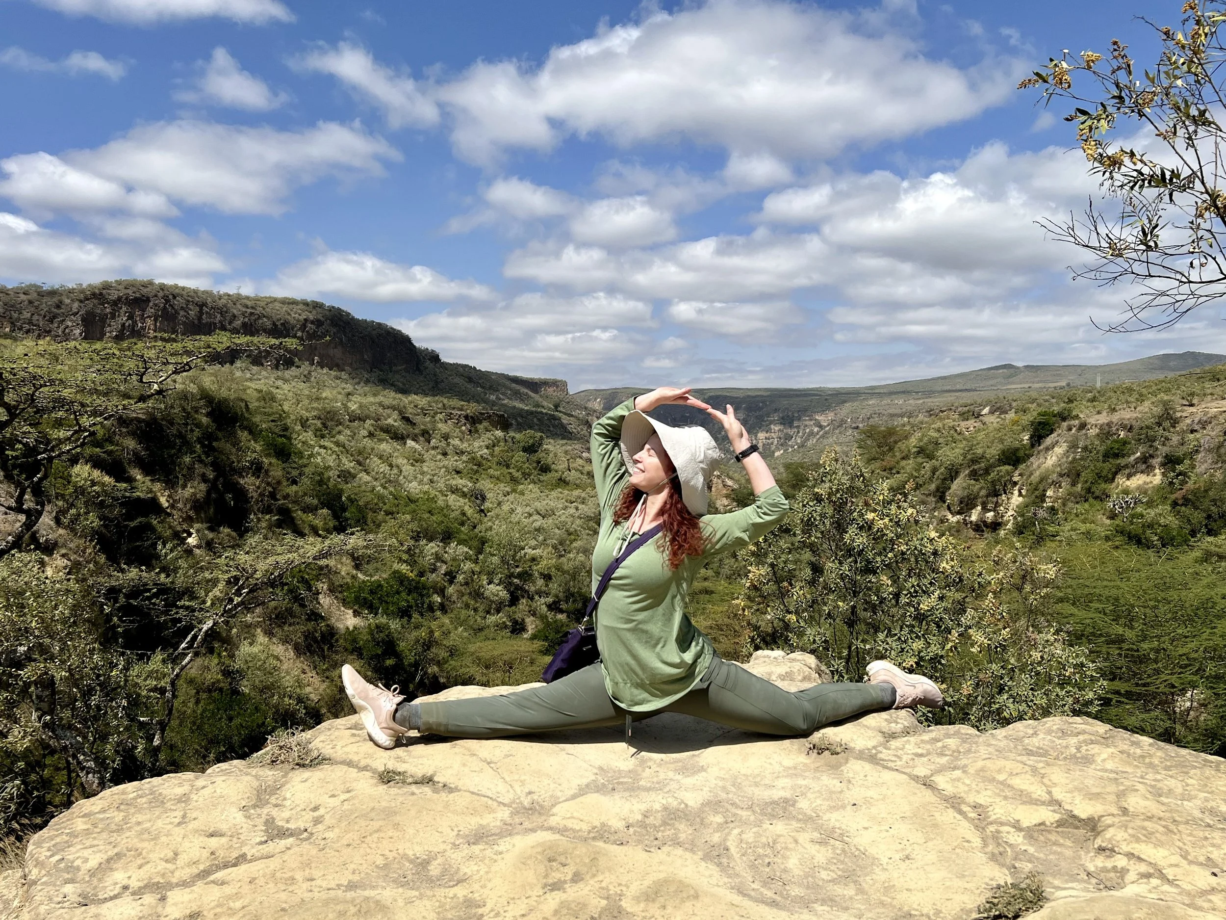 Yoga Retreat in Kenya doing the splits at Hell's Gate.jpeg