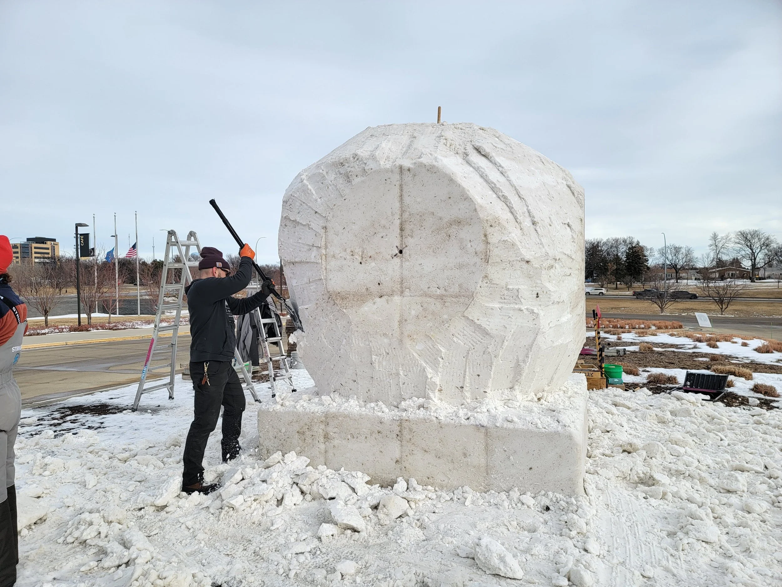 Carving the snow sculpture