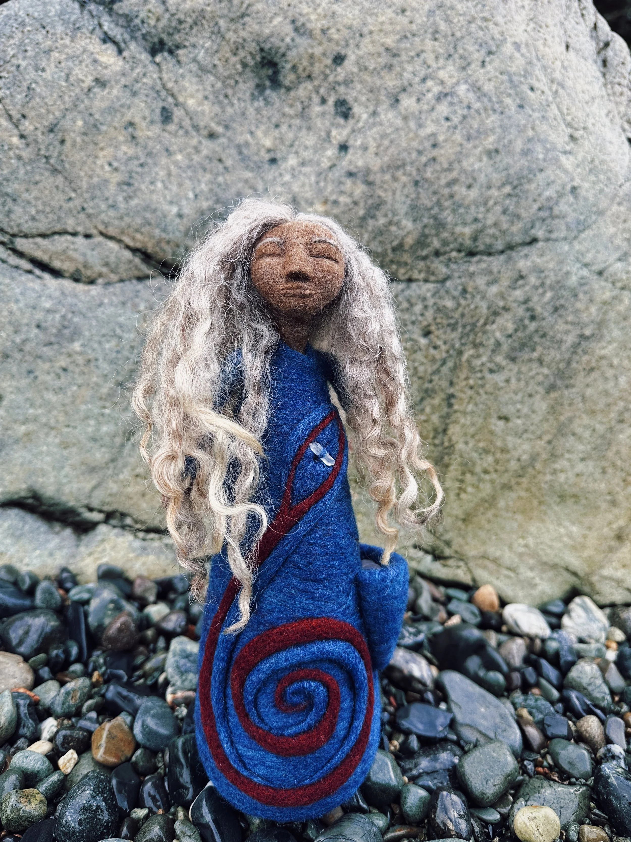 A doll of shedding, fire, and rebirth