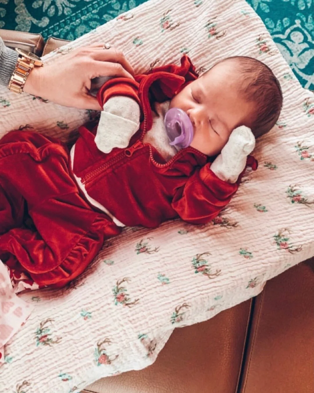 Newborn baby at her pediatric chiropractic appointment at The Chiropractic Place for Mommy and Me in Aledo, Texas