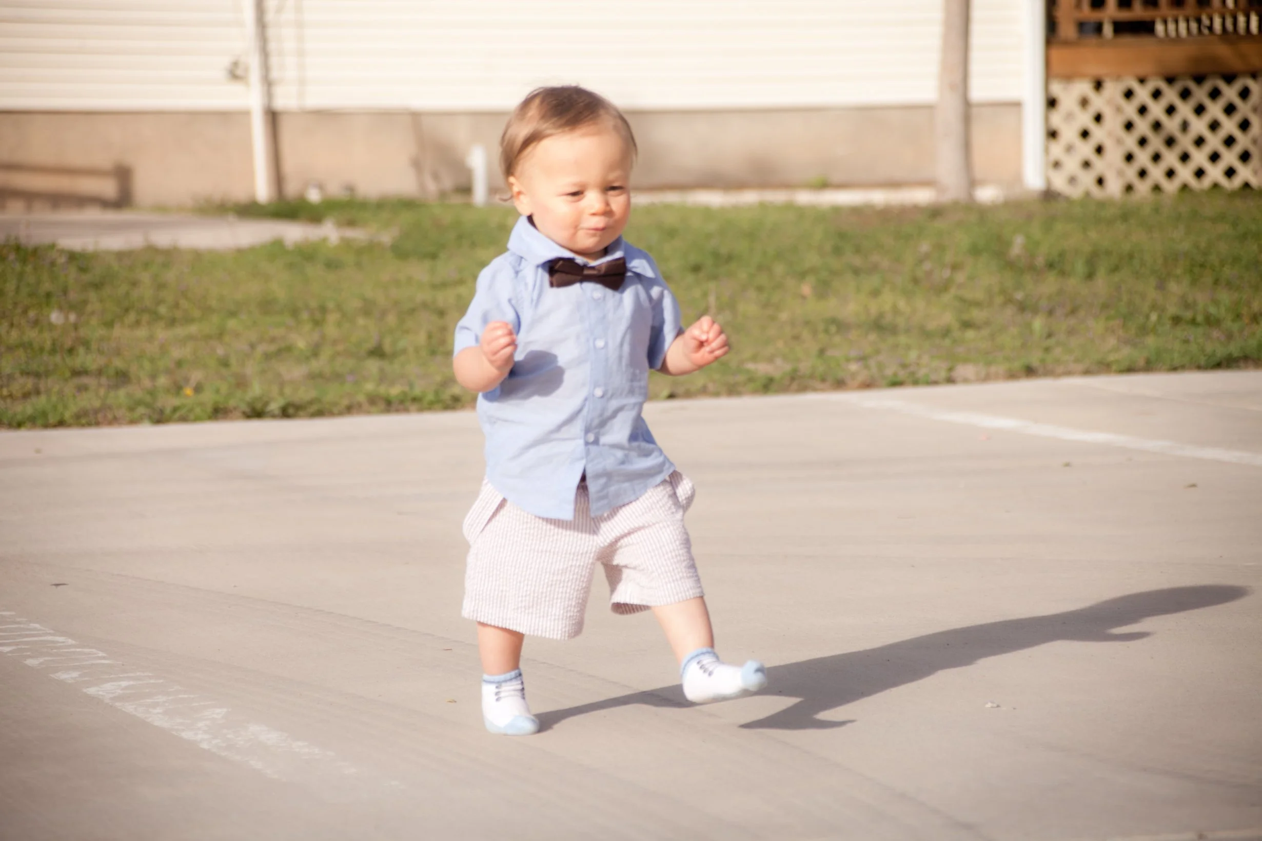 Baby walking outside The Chiropractic Place for Mommy and Me in Aledo, Texas