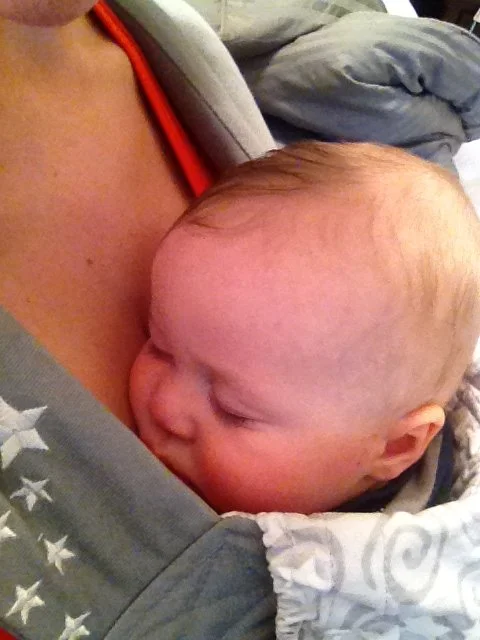 Infant child boy being baby worn in Aledo, Texas at The Chiropracitc Place
