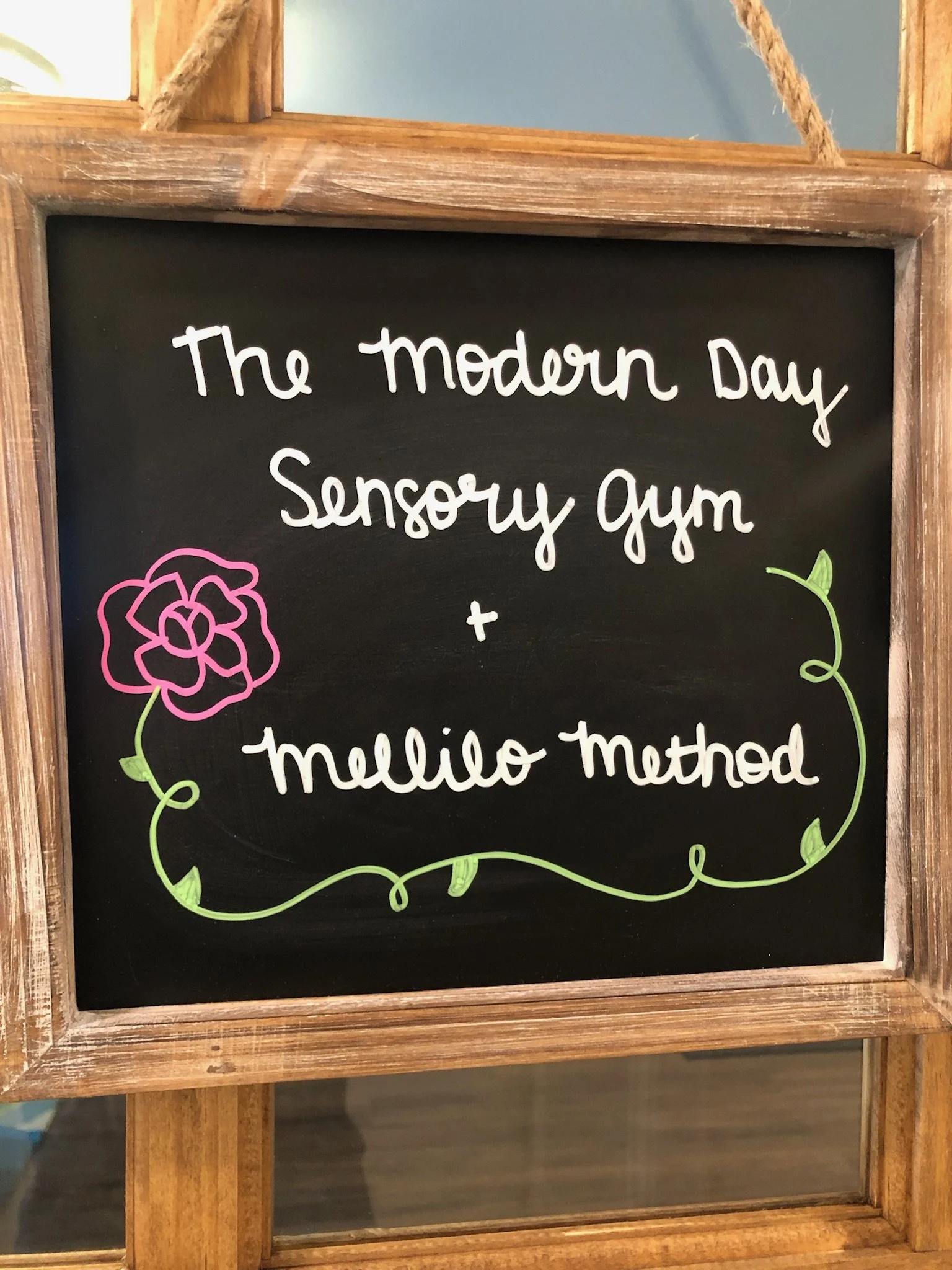 The sign leading into the modern day sensory gym at The Chiropractic Place for Mommy and Me using Melillo Method and primitive reflex integration in Aledo, Texas