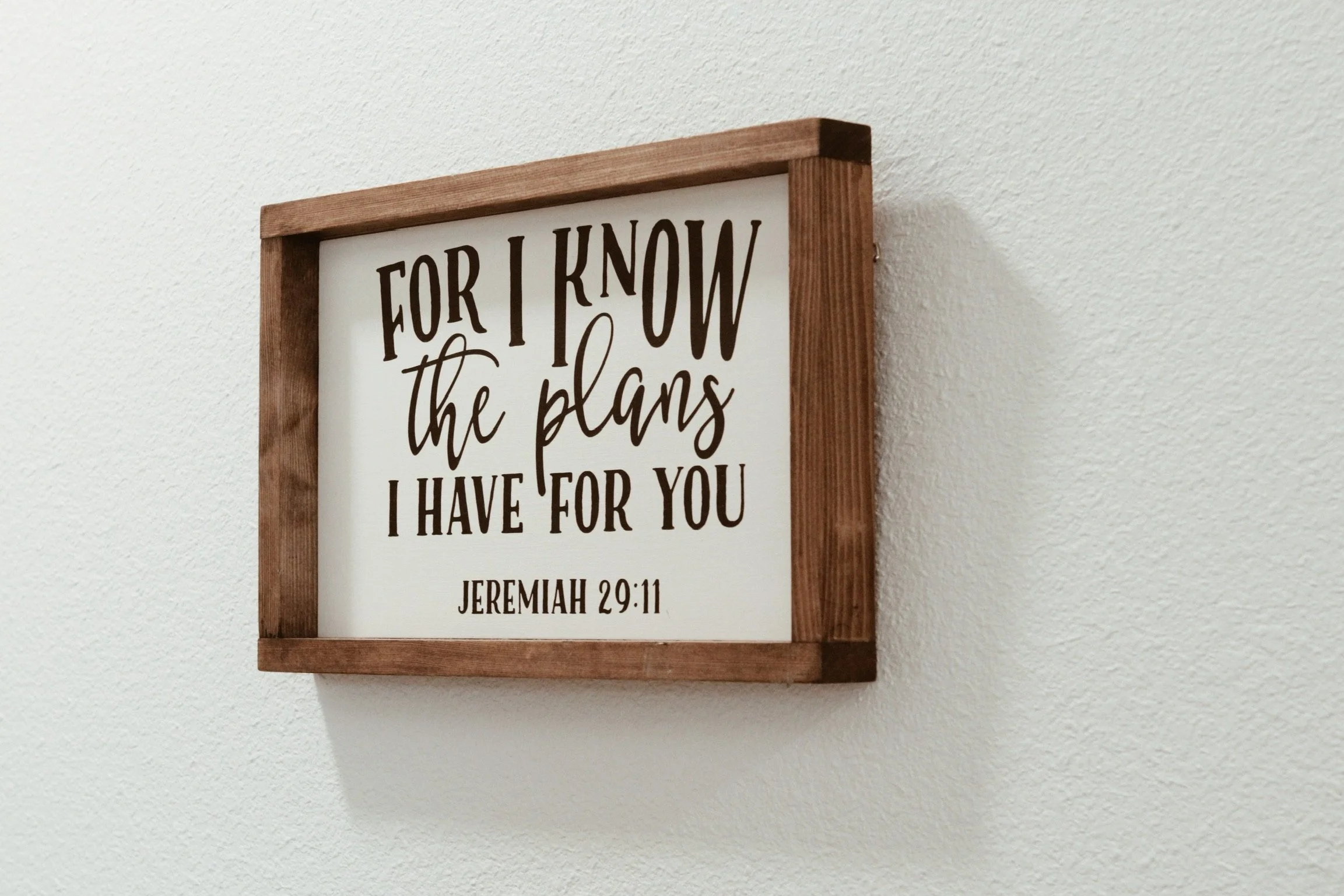 Christian sign in the hallway leading to the massage and craniosacral therapy room at The Chiropractic Place for Mommy and Me in Aledo, Texas