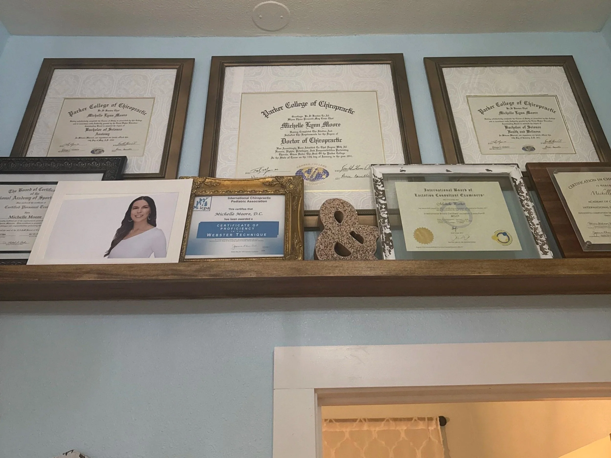 Webster Technique, Internation Board Certified Lacation Consultant and Doctor of Chiropractic diplomas and certificates hung at The Chiropractic Place for Mommy and Me in Aledo, Texas