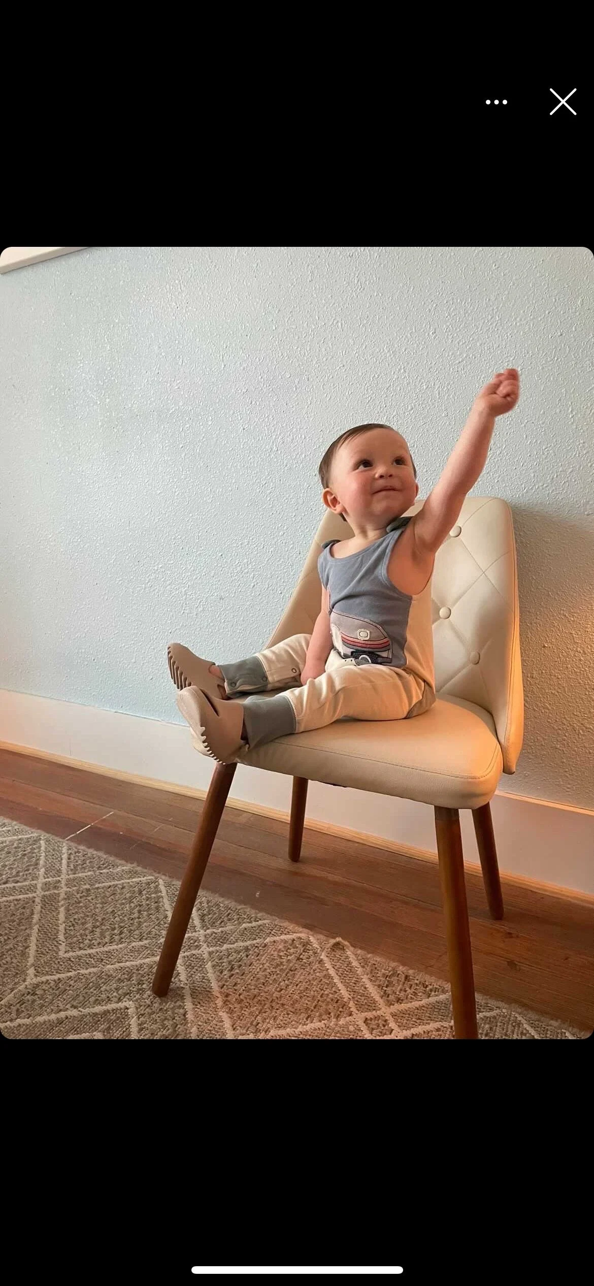 Boy toddler smiling and excited after his pediatric chiropractic adjustment at The Chiropractic Place for Mommy and Me in Aledo, Texas