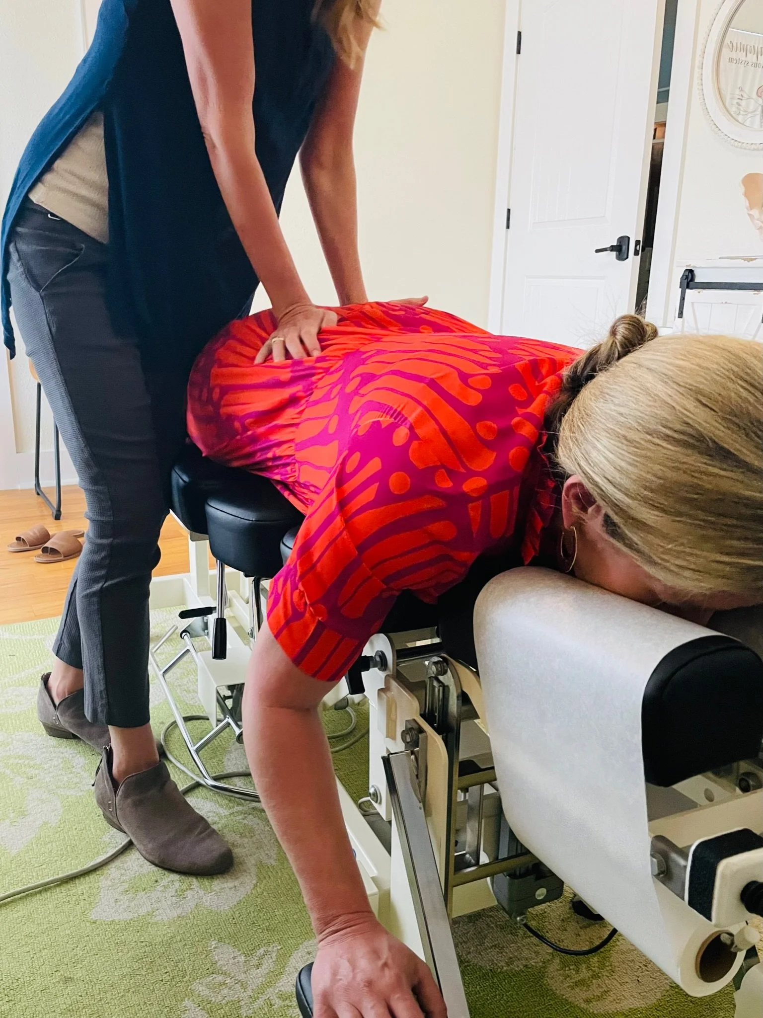 Adult chiropractic adjustment at The Chiropractic Place for Mommy and Me in Aledo, Texas