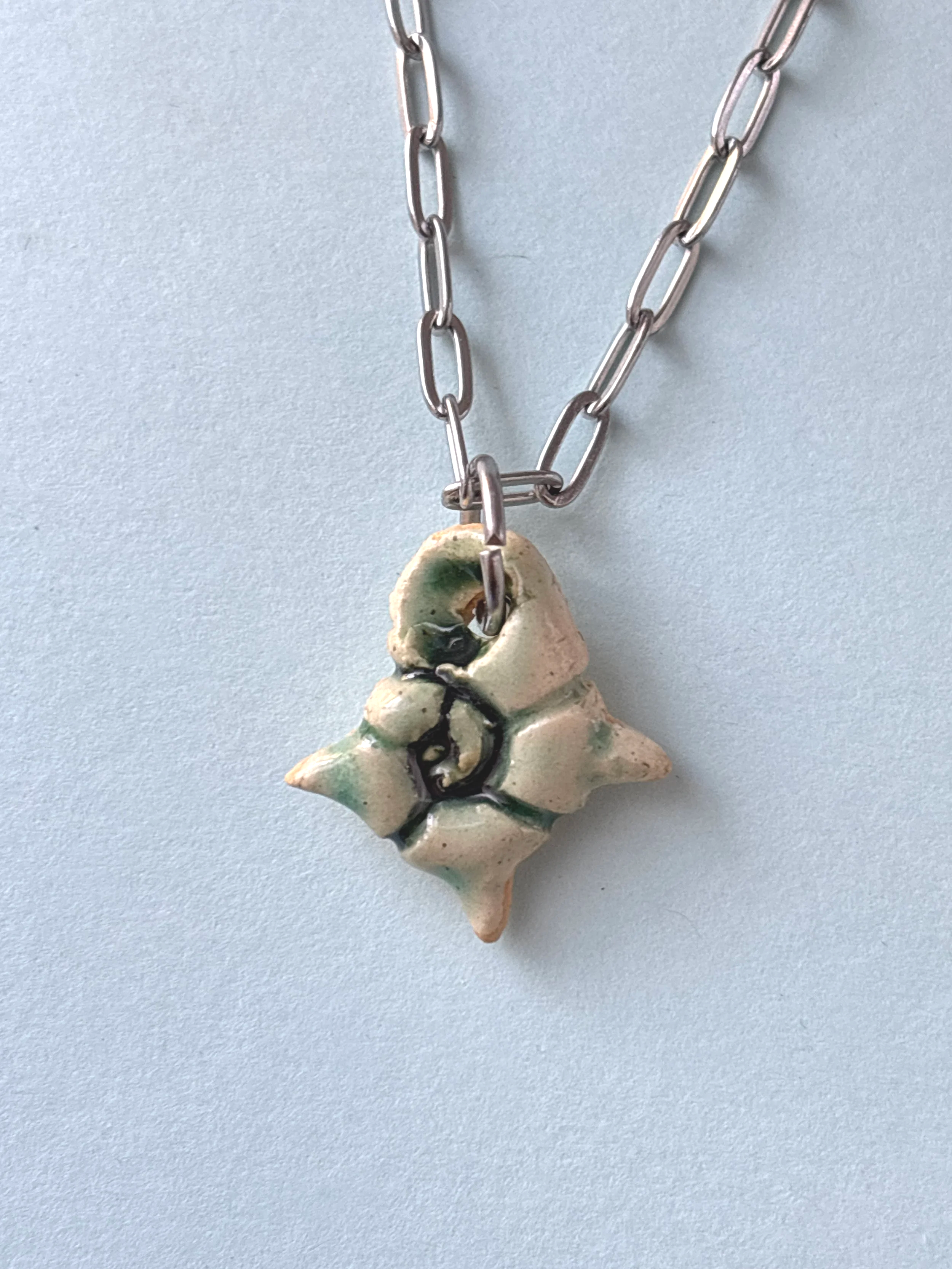 spiky spiral shell pendant 7 (.7")