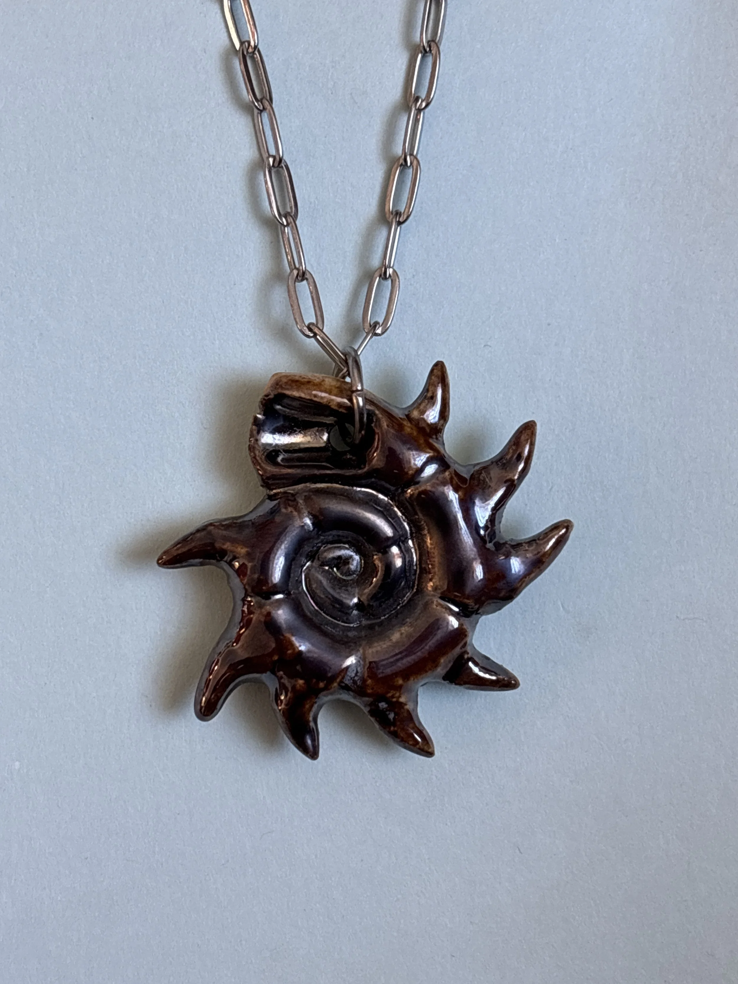 spiky spiral shell pendant 1 (1.3")