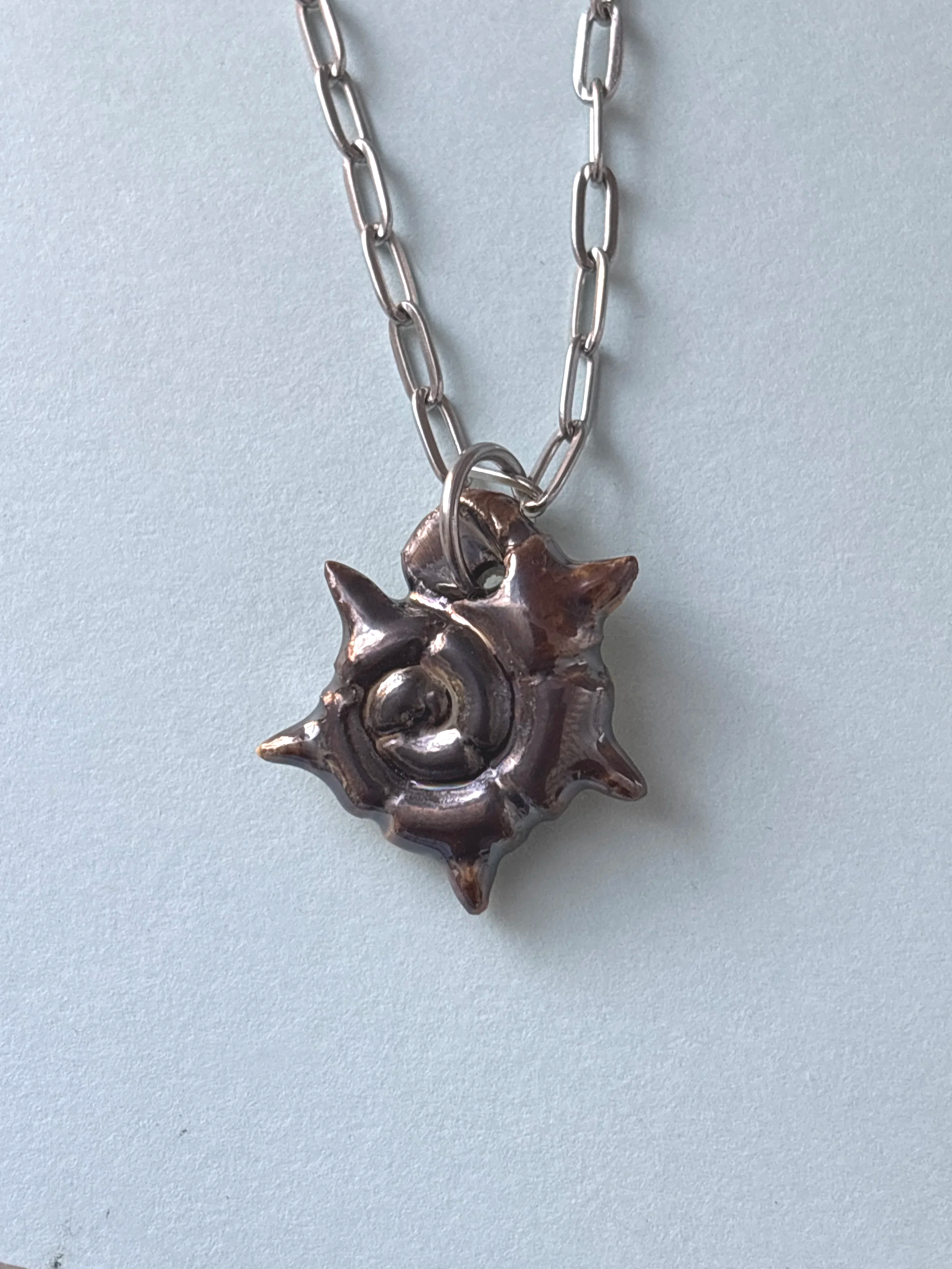 spiky spiral shell pendant 4 (.8")