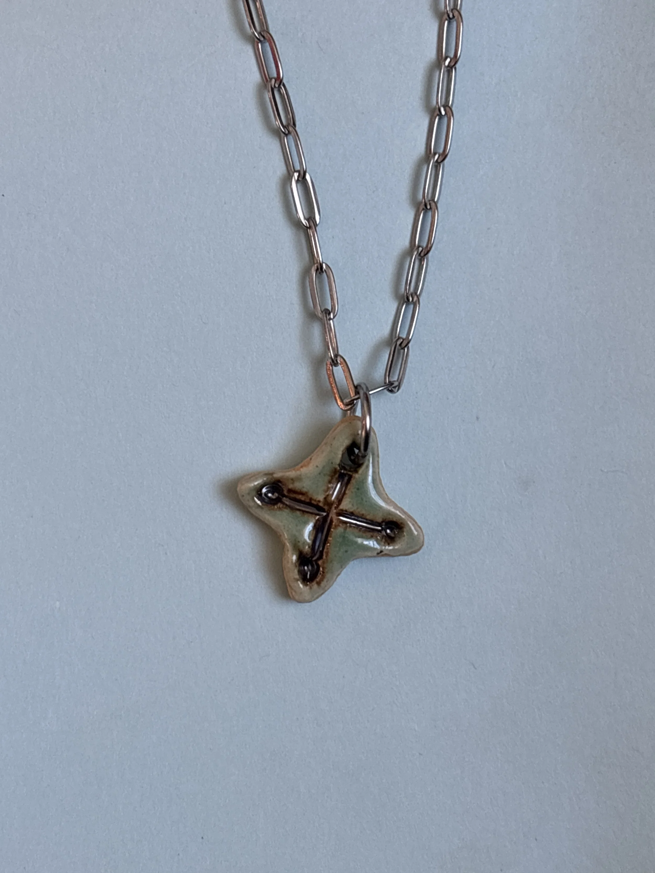 green copper oxide cross pendant (.7")