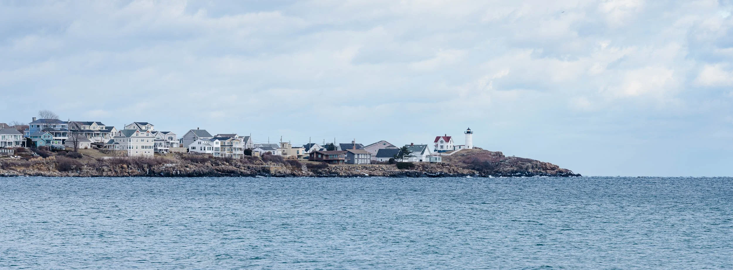 Nubble Lighthouse on the horizon.jpg