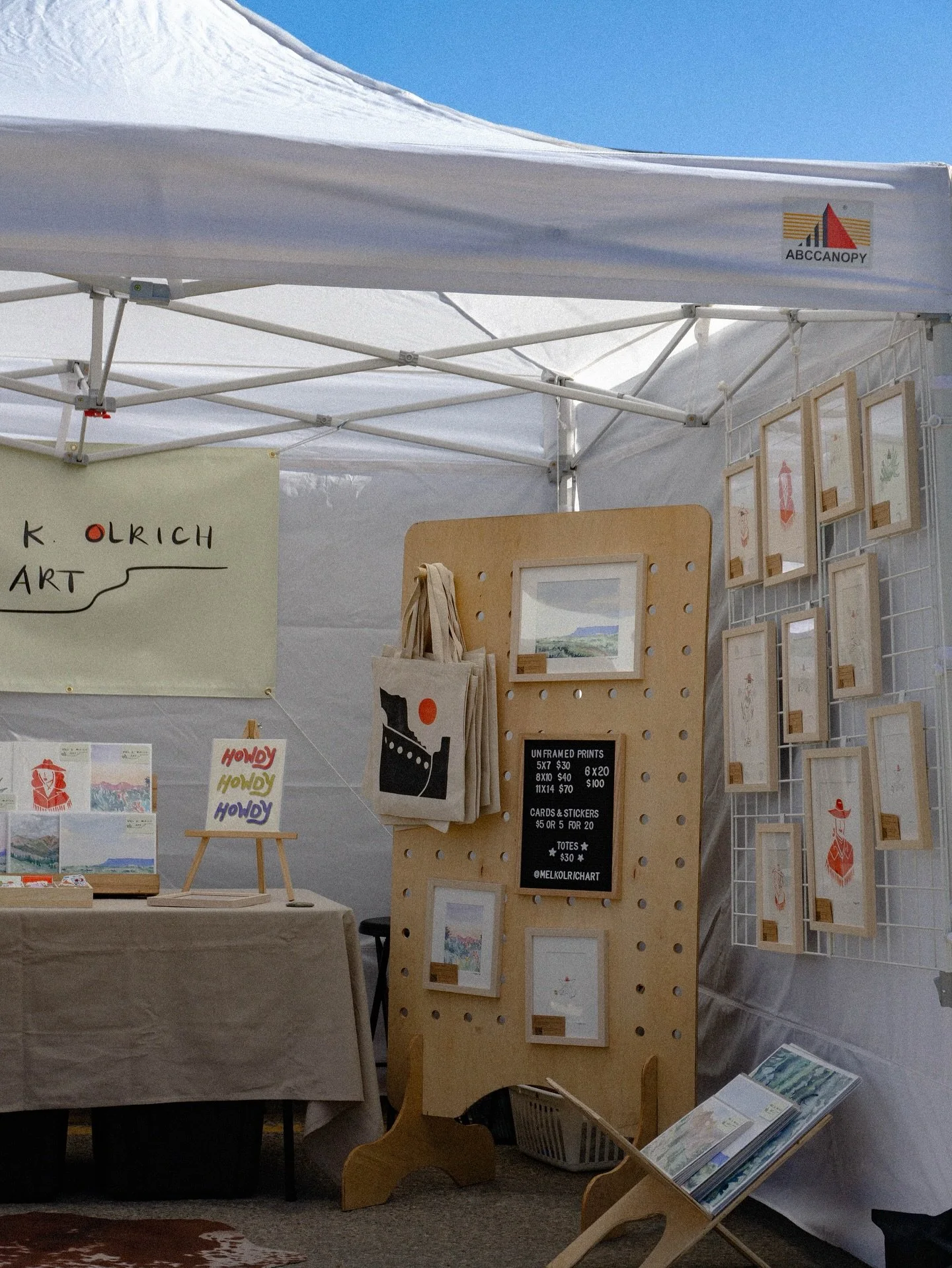 Booth set up at this year&rsquo;s Burro Fest vs my booth set up at my very first market back in 2022 (last slide). 

One thing you may not realize if you&rsquo;re not an artist/small biz owner is that it is a huge investment to get everything you nee