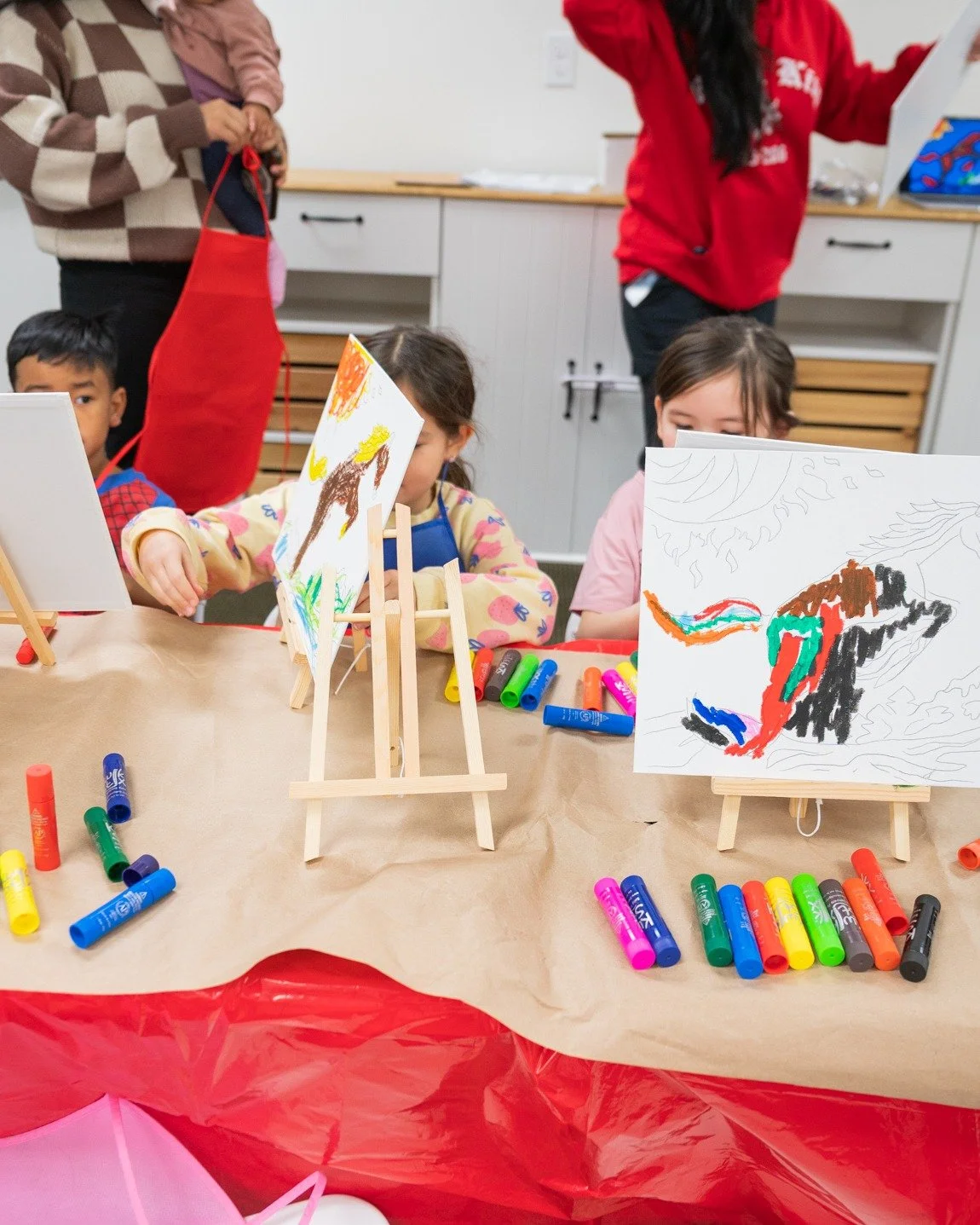 Laro Tayo's local graphic designer and artist helped us celebrate Lunar New Year this year by bringing an original artwork for both kids and grownups to put their own touches.

Except between the time we set up and grabbing my camera, half of the you