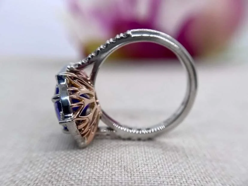 18ct white gold vintage style ring set with a 3.2ct tanzanite and 1.1cts of round and baguette cut diamonds.