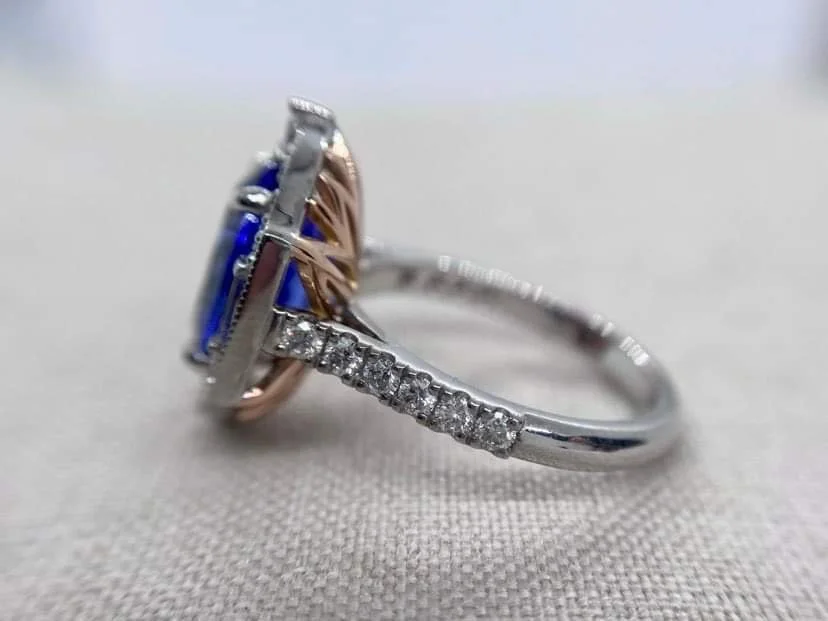 18ct white gold vintage style ring set with a 3.2ct tanzanite and 1.1cts of round and baguette cut diamonds.