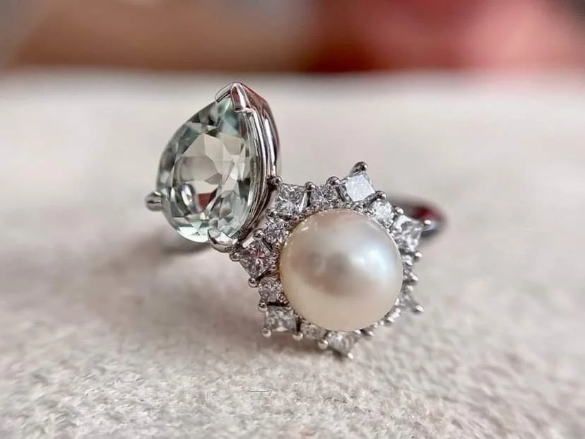 18ct white gold Akoya pearl, diamond and pear cut amethyst toi et moi ring.