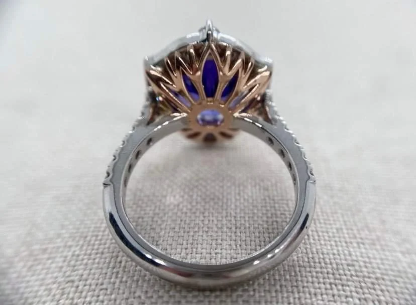 18ct white gold vintage style ring set with a 3.2ct tanzanite and 1.1cts of round and baguette cut diamonds.