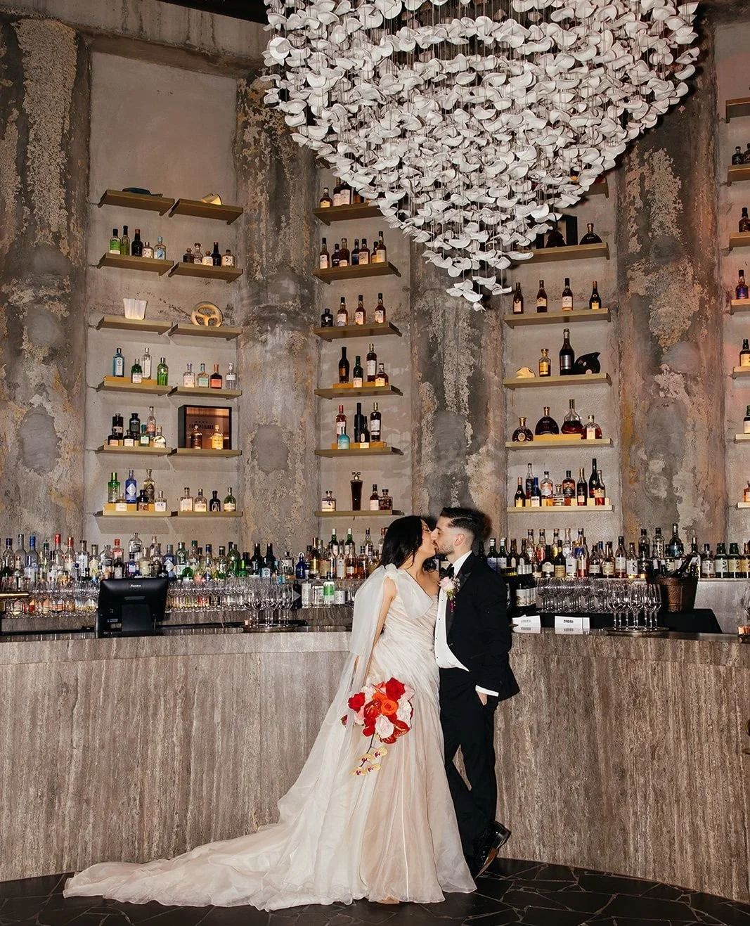 A backdrop that feels cinematic. ⁠A look back on Alice &amp; Laurence's big day 💫.⁠
⁠
If you're seeking a bold, dramatic setting for your wedding, @yugendining offers an atmosphere that is both intimate and striking. With its breathtaking design and