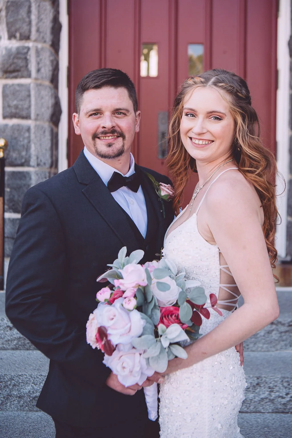 A stunning portrait of a bride and groom during their wedding at Searles Chapel in Windham, NH. Wedding photography by Mike Indi.