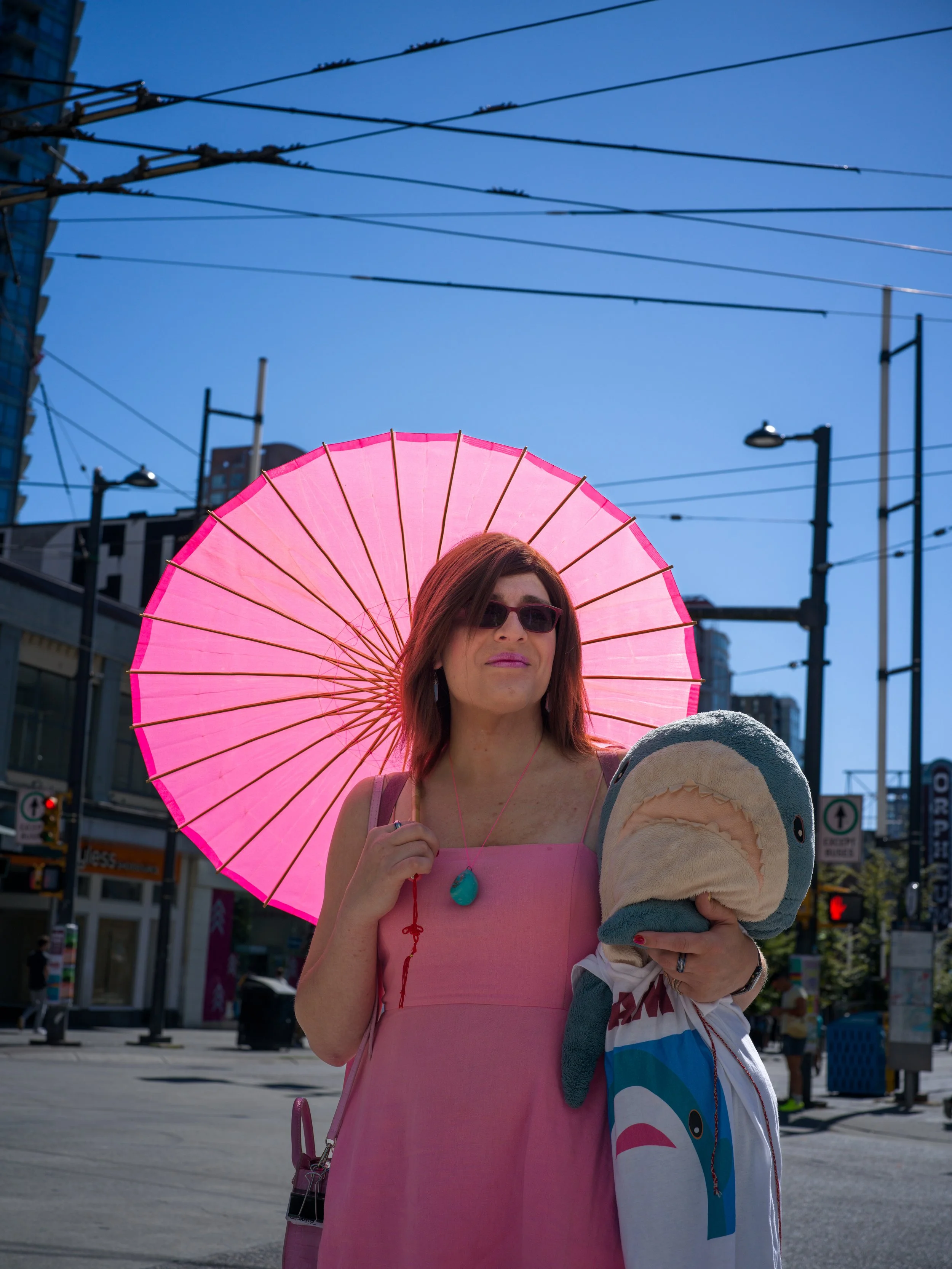 Laura Williams Photography_street scene_vancouver_pink umbrella-16.jpg