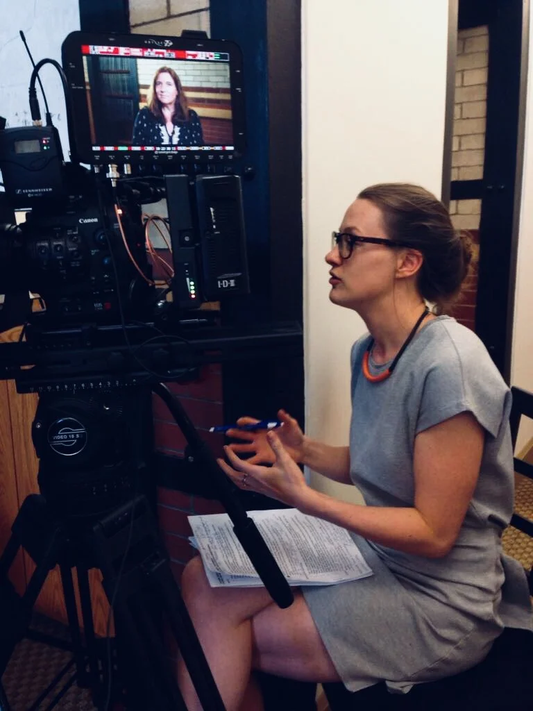 Kirsty Malcolm interviewing on-location