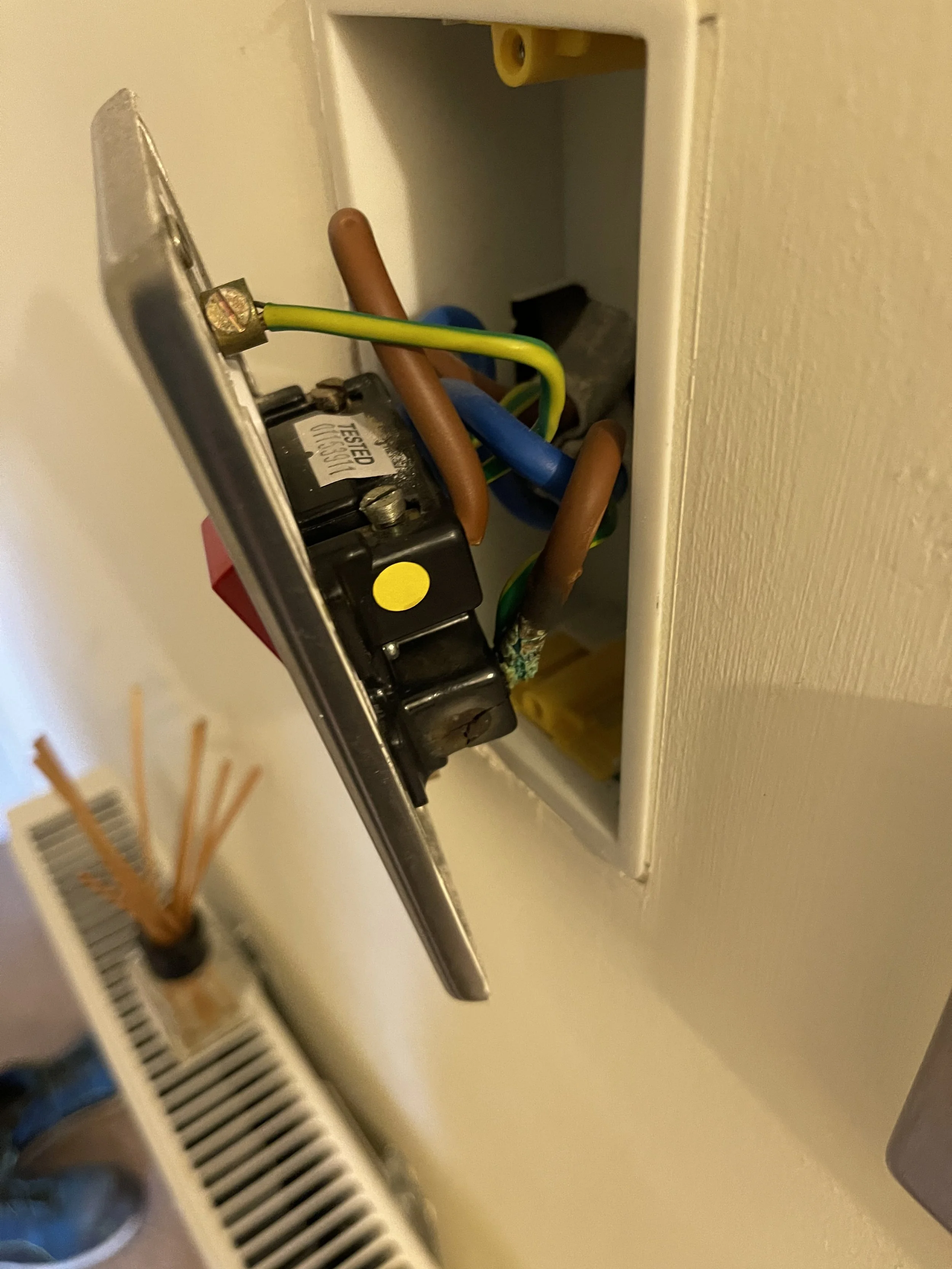 A burned out shower isolator found on an EICR in North Devon