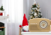 A room decorated for Christmas with a radio front and centre