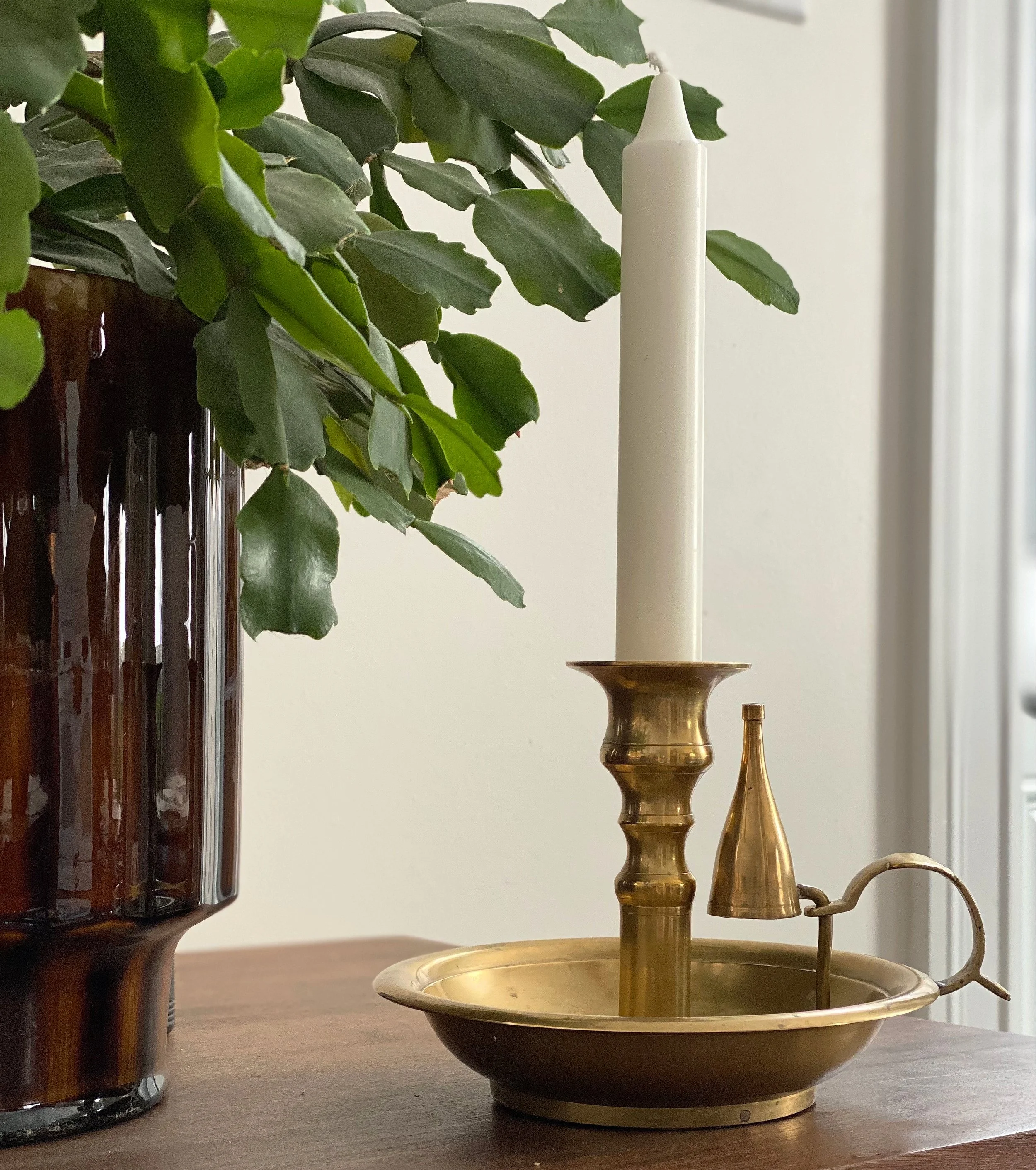 large brass candle holder with snuffer