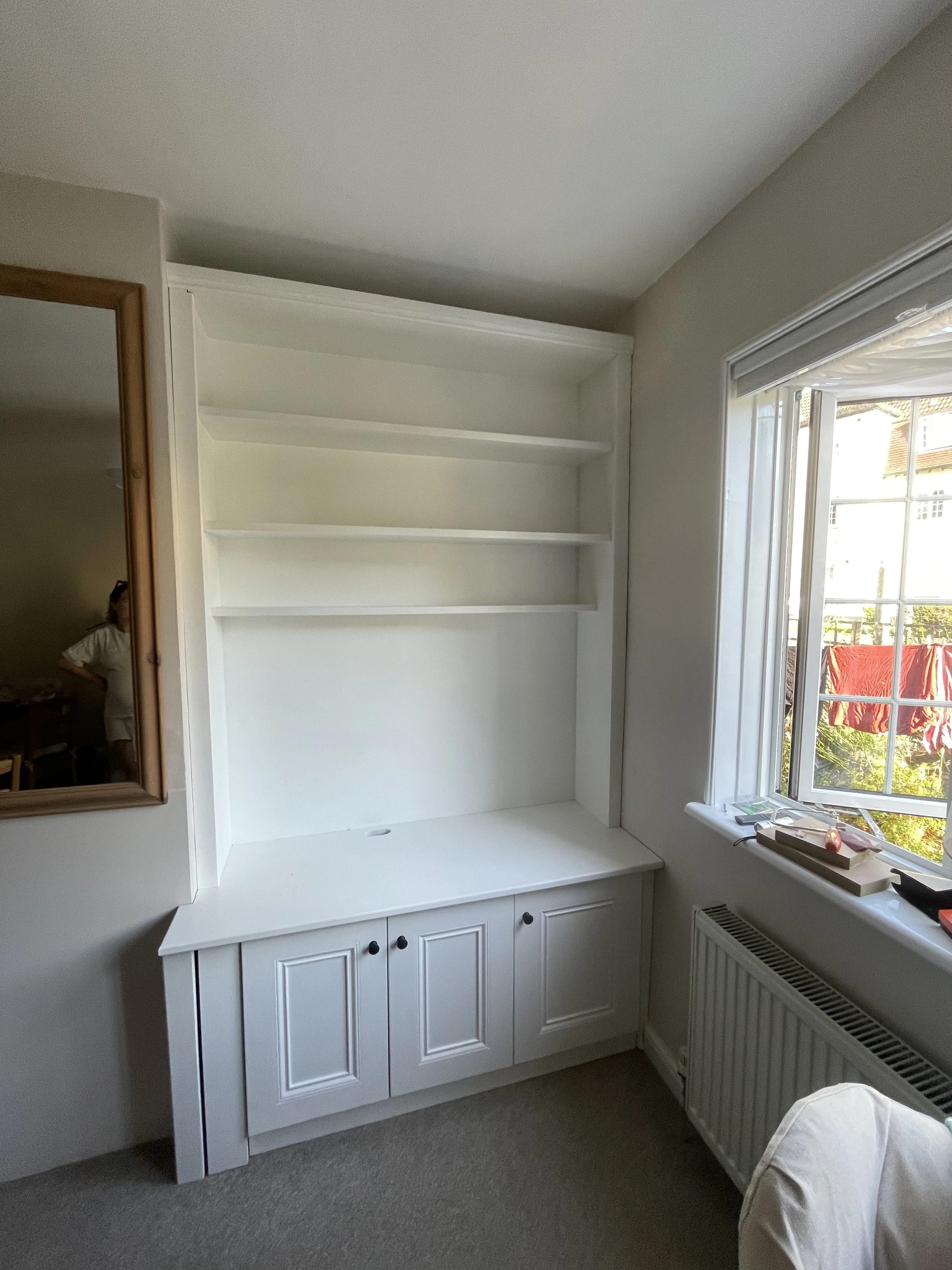 Photo of a cabinet built into an alcove