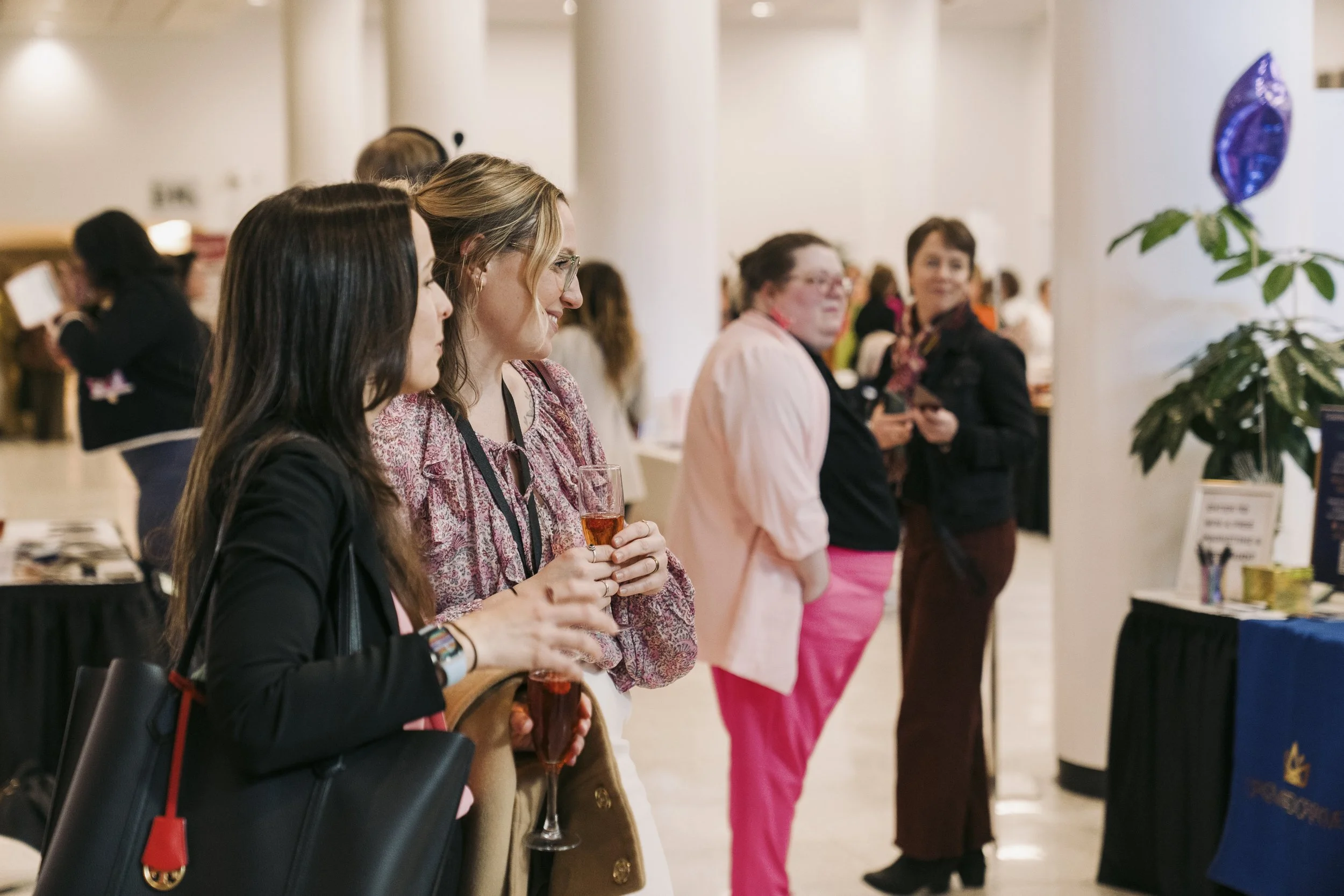 Women enjoy happy hour at CNY Womens Summit