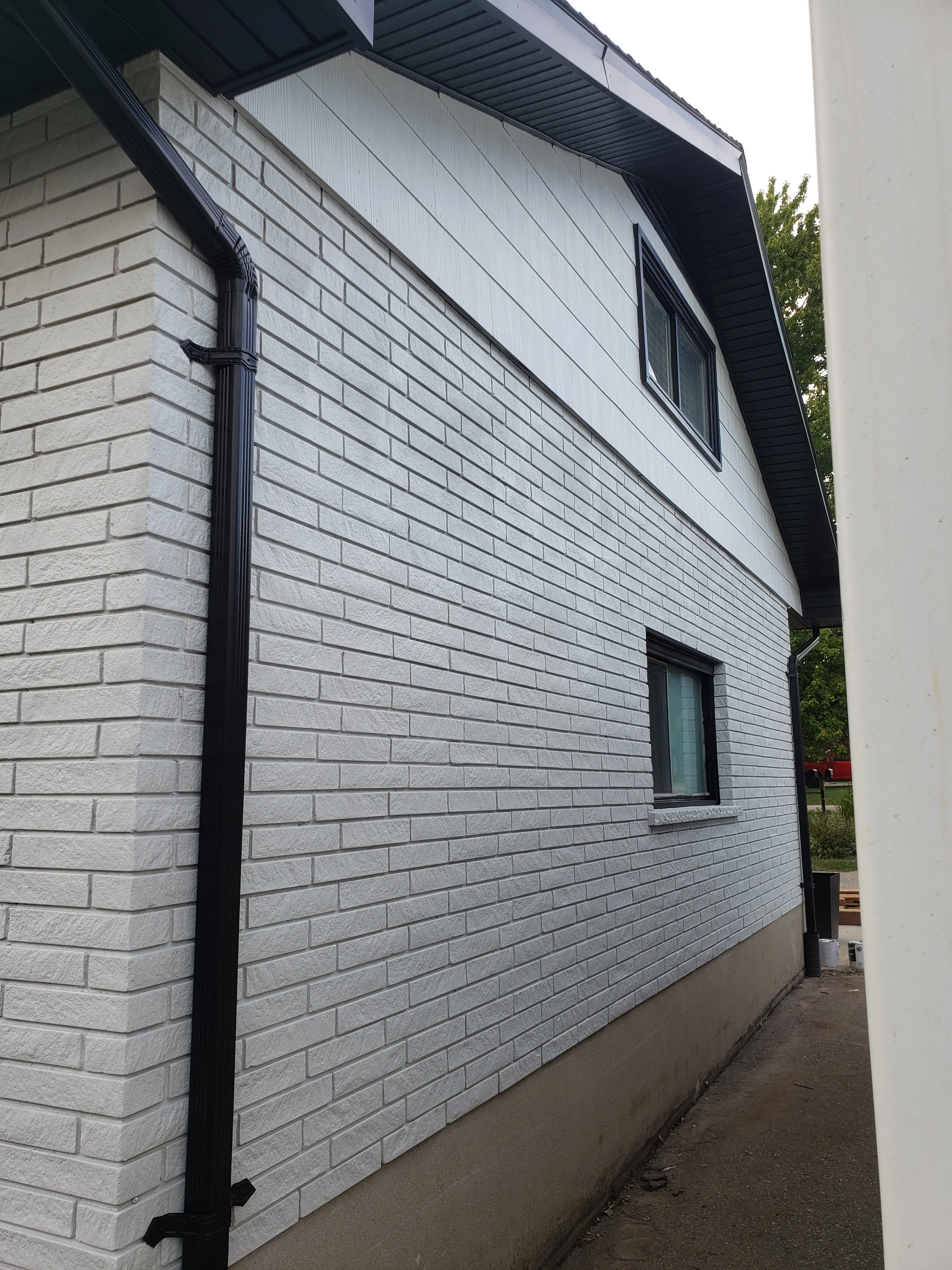 Job completed by us; ainting of siding, brick, soffit, fascia and windows 