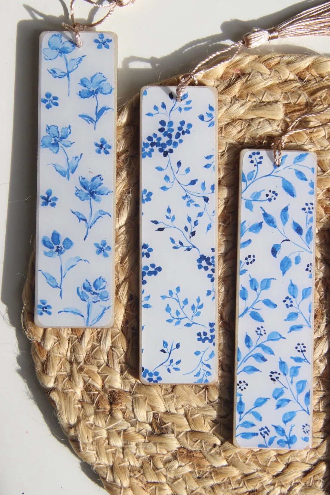 Set of illustrated bookmarks with intricate blue-and-white floral and ornamental patterns inspired by Dutch Delft ceramics and Jaipur blue pottery from India
