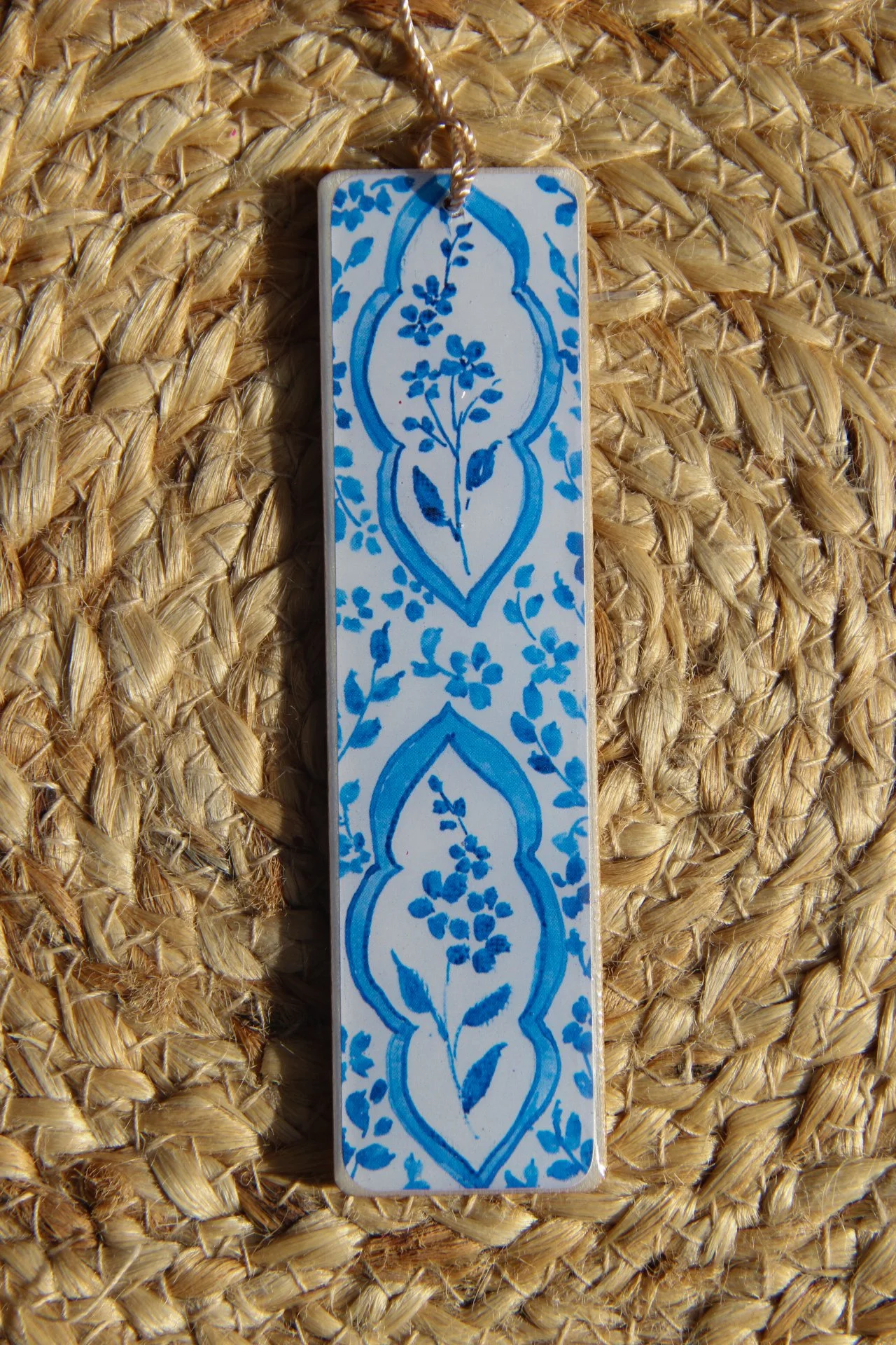 Set of illustrated bookmarks with intricate blue-and-white floral and ornamental patterns inspired by Dutch Delft ceramics and Jaipur blue pottery from India