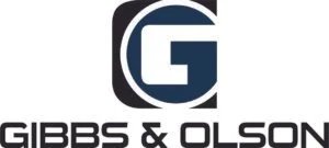 Gibbs & Olson logo, featuring a stylized "G" inside a dark blue and black emblem above the company name.