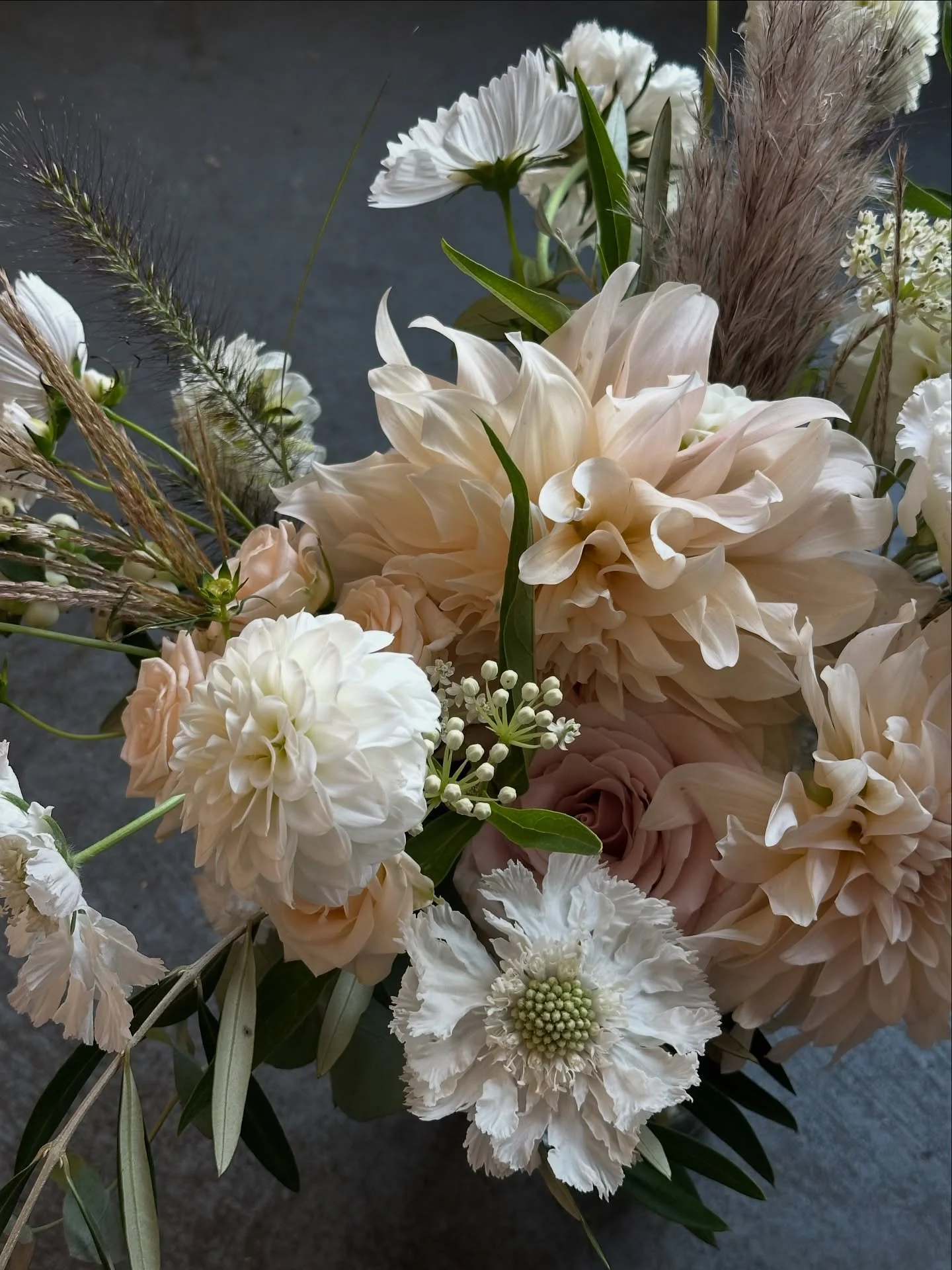 Autumn romance in every bouquet, with caf&eacute; au lait dahlias, cosmos, and pampas adding the perfect touch of texture for J + A&rsquo;s dreamy celebration. 🤎

Vancouver Wedding Florist | Autumn Wedding | Pampas Weddings | Wedding Florals | Fall 