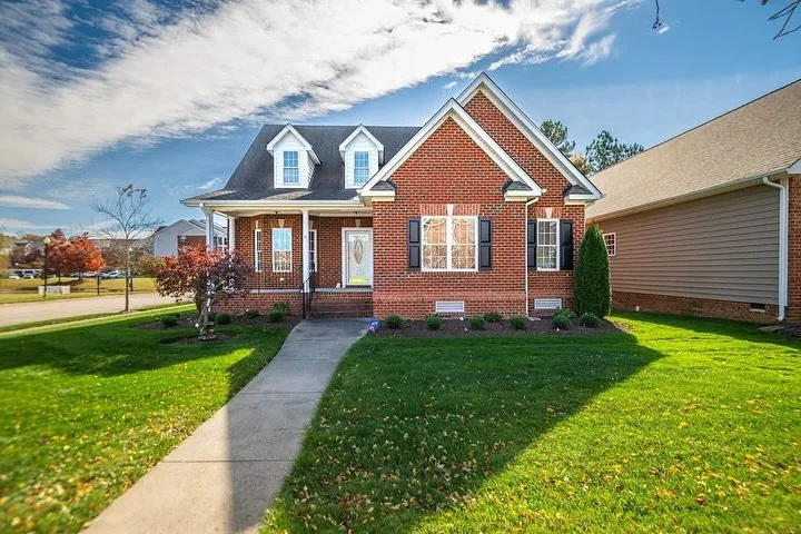 Your next home is here!

Classic charm and modern comfort come together beautifully in this Chester gem! Perfectly positioned on a corner lot in the desirable Chester Village community, this two-story brick home offers a warm, welcoming atmosphere bo
