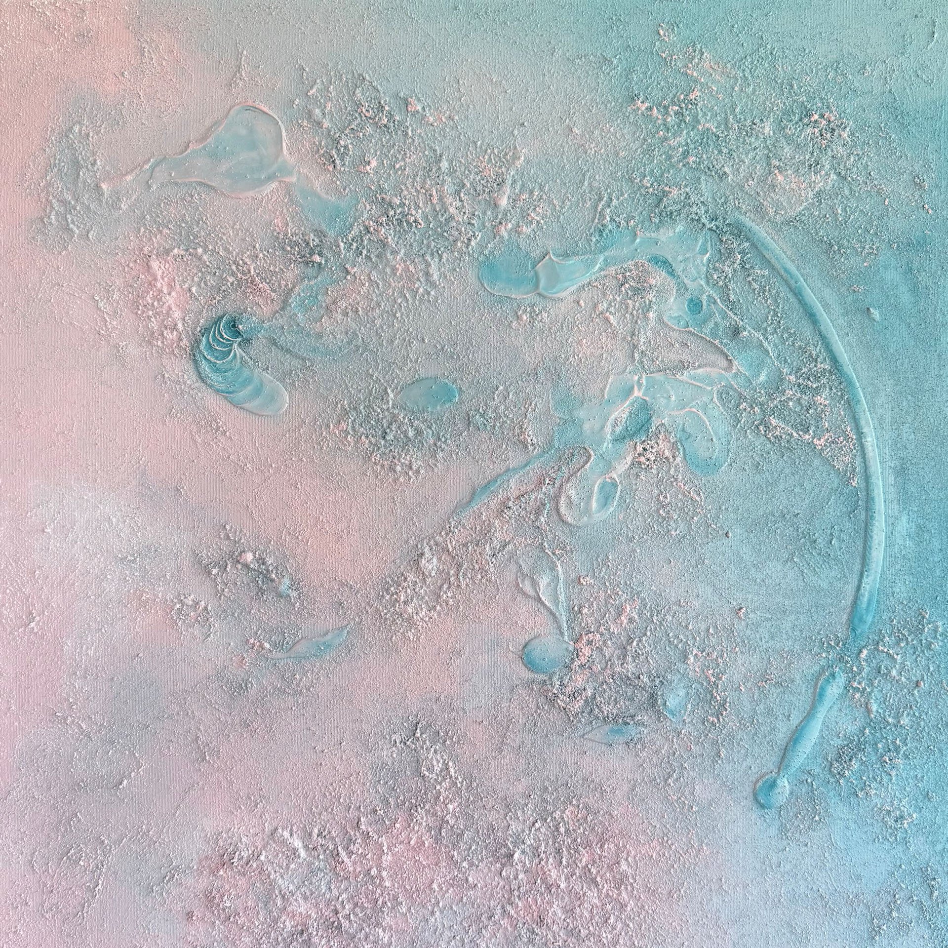 Close-up of colorful powder and blobs of pastel blue and pink paint on textured surface with a soft gradient background.