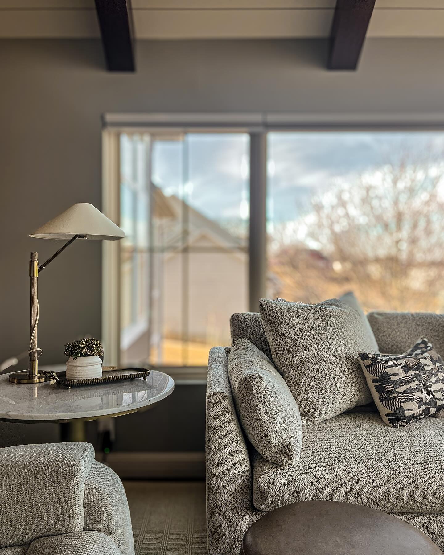 For a family always on the go, this space was all about slowing down.

They didn&rsquo;t need a TV&mdash;just a great view and a place to breathe. No bold patterns or loud colors, just soft layers of texture and comfort. Nothing too formal here&mdash
