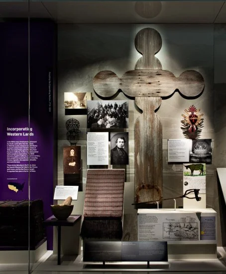 center case in the museum’s “Many Voices, One Nation” exhibition contains images and artifacts connected to the history of the Del Valle family and their home,  Rancho Camulos