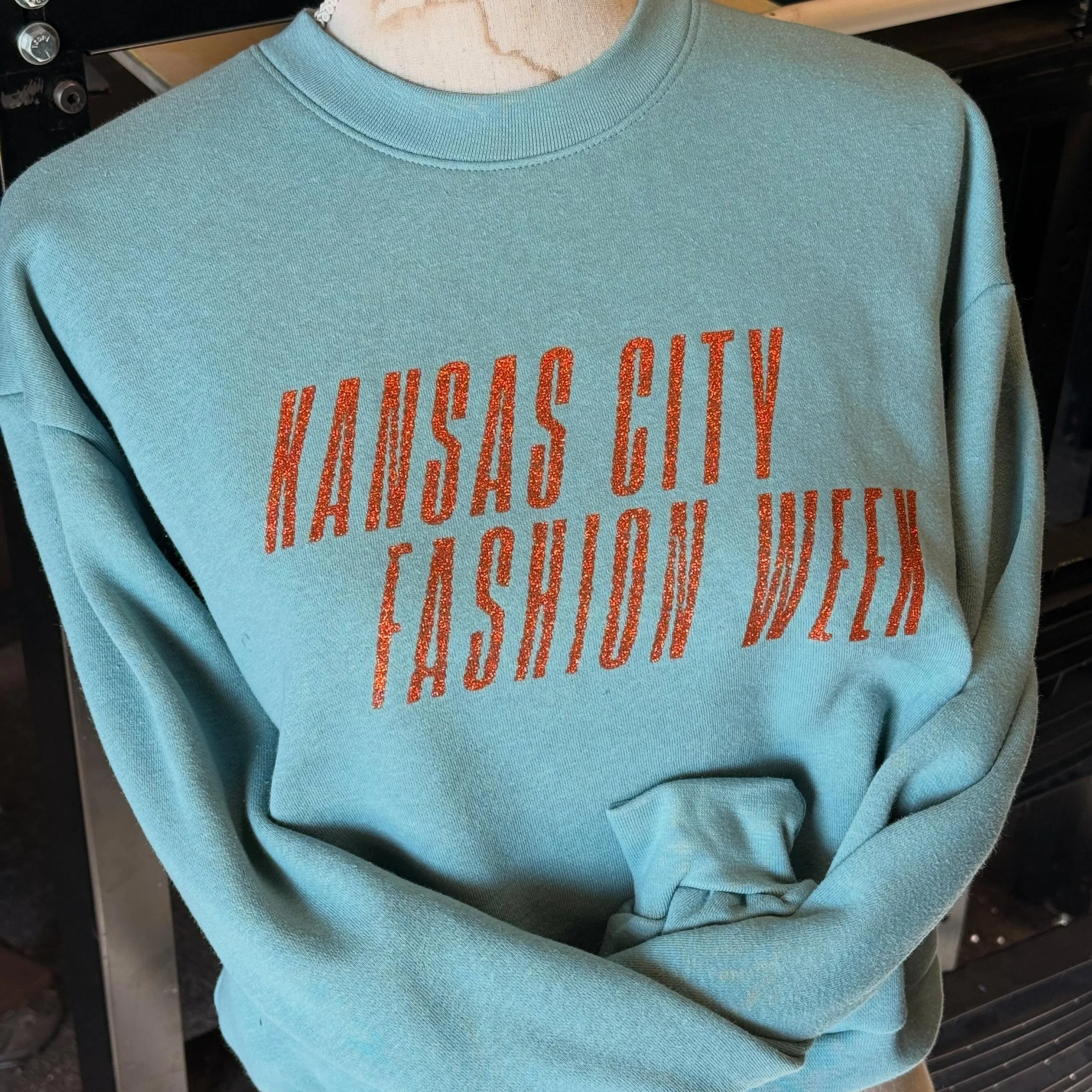 You know what&rsquo;s really polarizing? Glitter. But we love it ✨✨ previous merch for @kc_fashionweek ! #kcfw