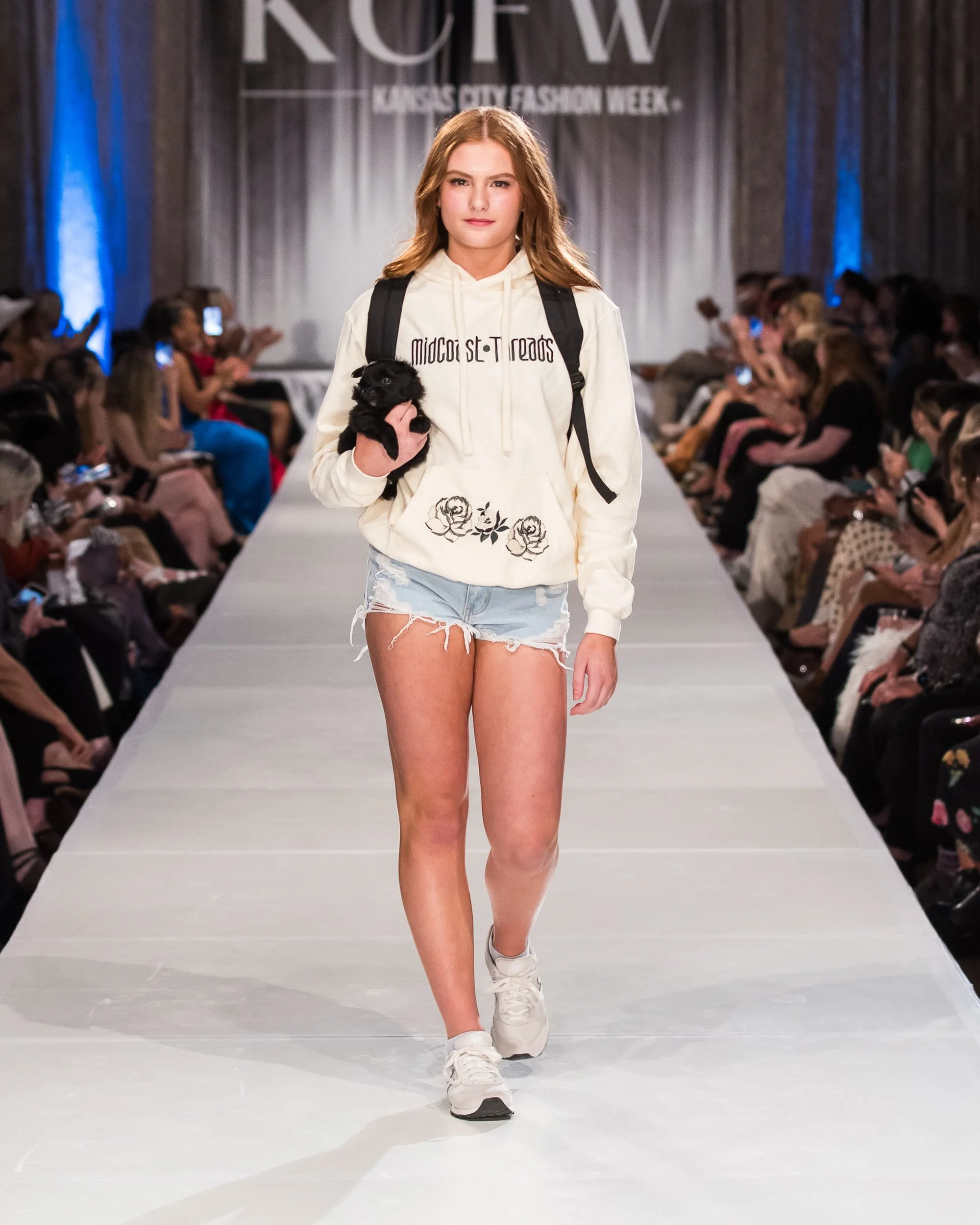@macyzeier320 sporting the first hoodie we ever embroidered the kangaroo pouch! Aaaaaaand also with a @pawportunities_rescue puppy 🥰 #kcfw &bull;&bull;&bull; photo by @elistackphoto