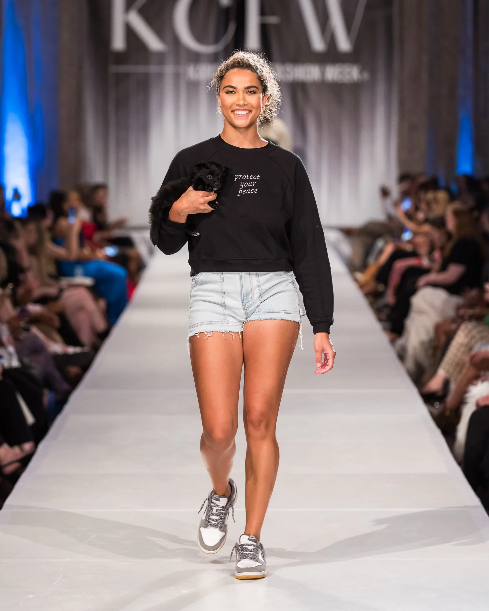 @jada.burris with the crop hoodie &ldquo;protect your peace&rdquo; - a personal movement she shared with us as we shaped the collection! #kcfw &bull;&bull; photo by @elistackphoto