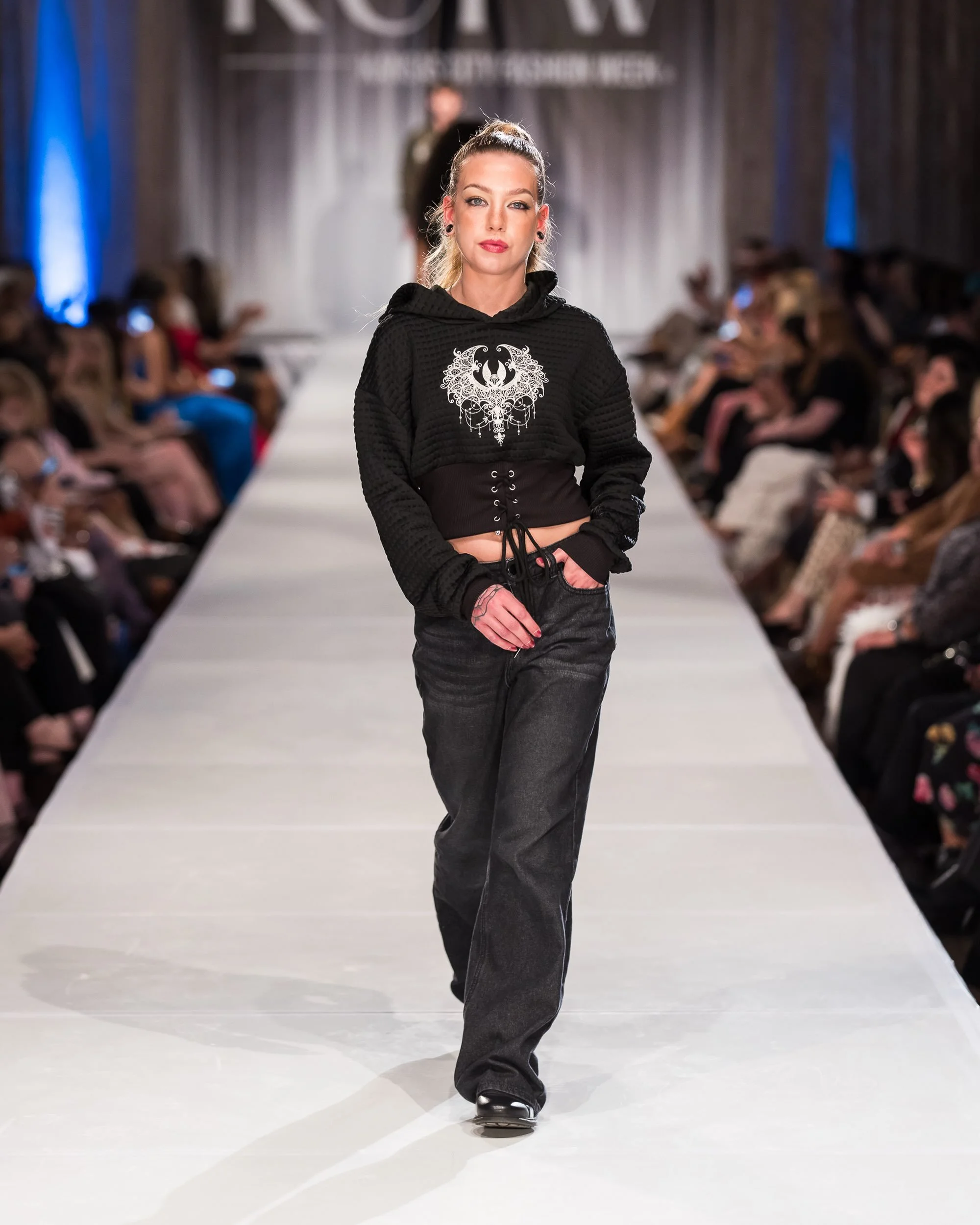 @_itselectric owned this look. The second we made it we knew it was hers. Lace bat embroidered detail + she command of the runway. Chefs kiss. &bull;&bull; #kcfw &bull;&bull; photo by @elistackphoto