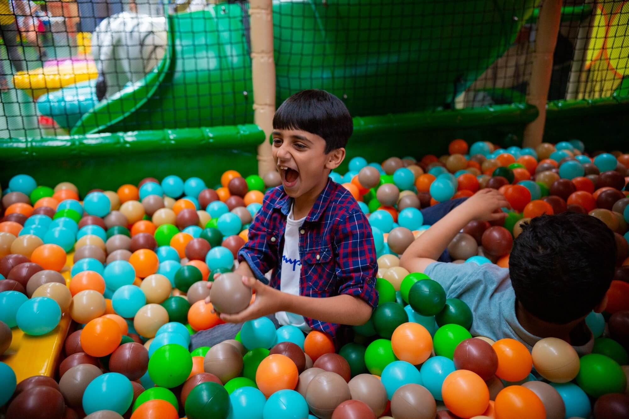 Boy in Ball Pit Laughing _ Westgate Sports & Leisure Centre.jpg