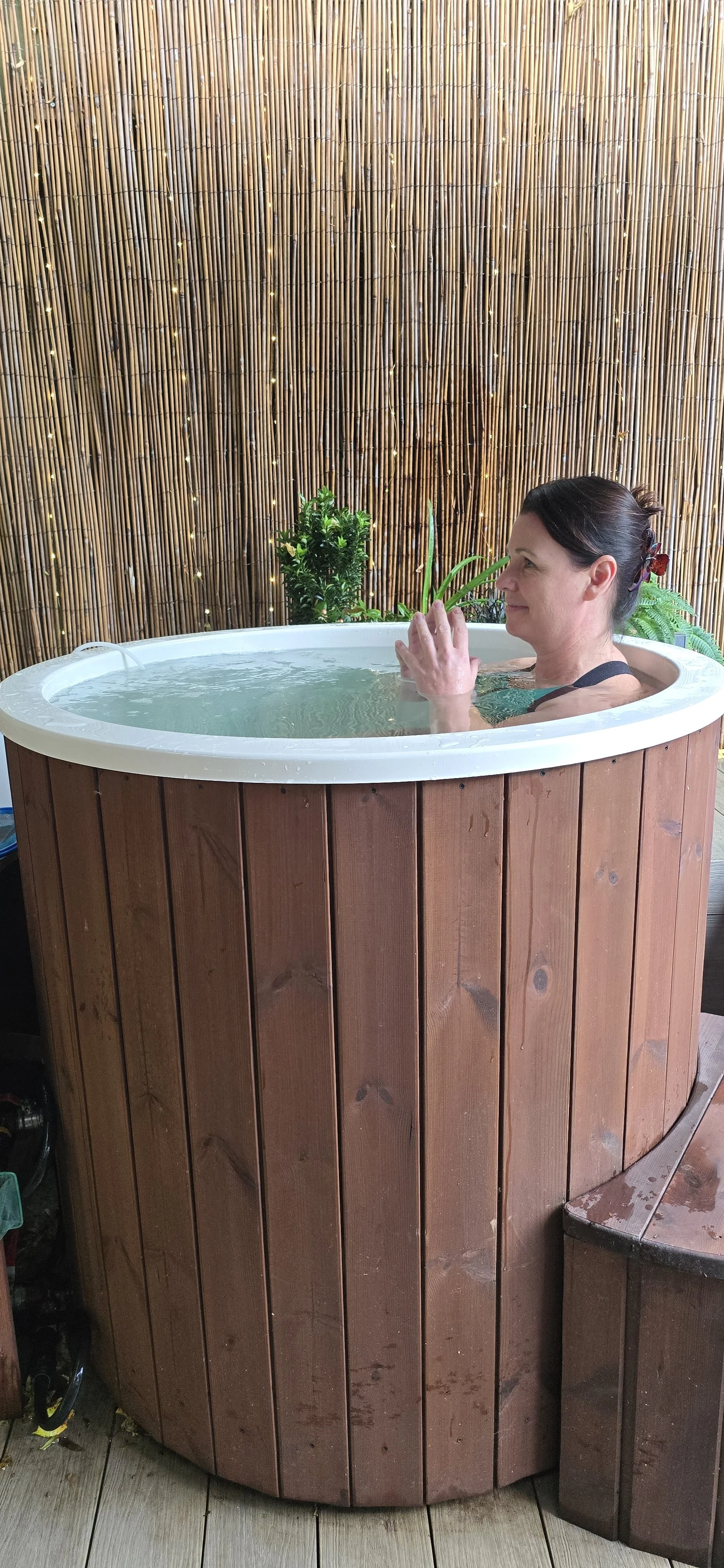 Chantelle practicing some cold water therapy in a cold tub