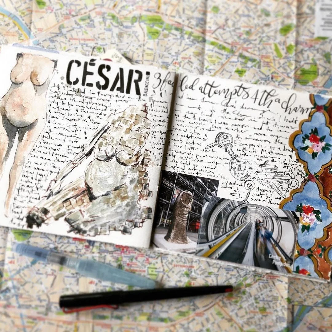 Sketchbook spread of Paris trip over map